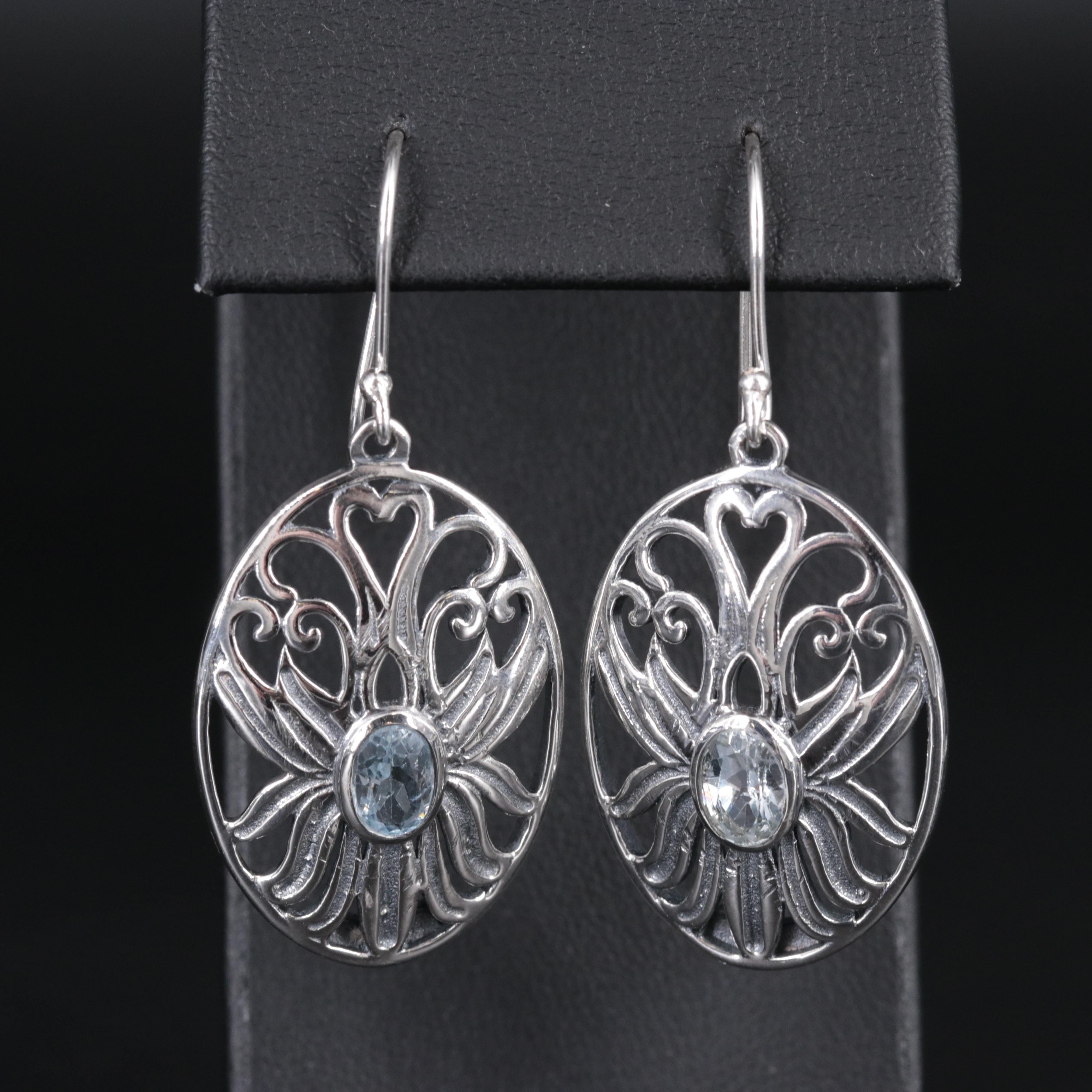 Sterling Silver Earrings Including Blue Topaz