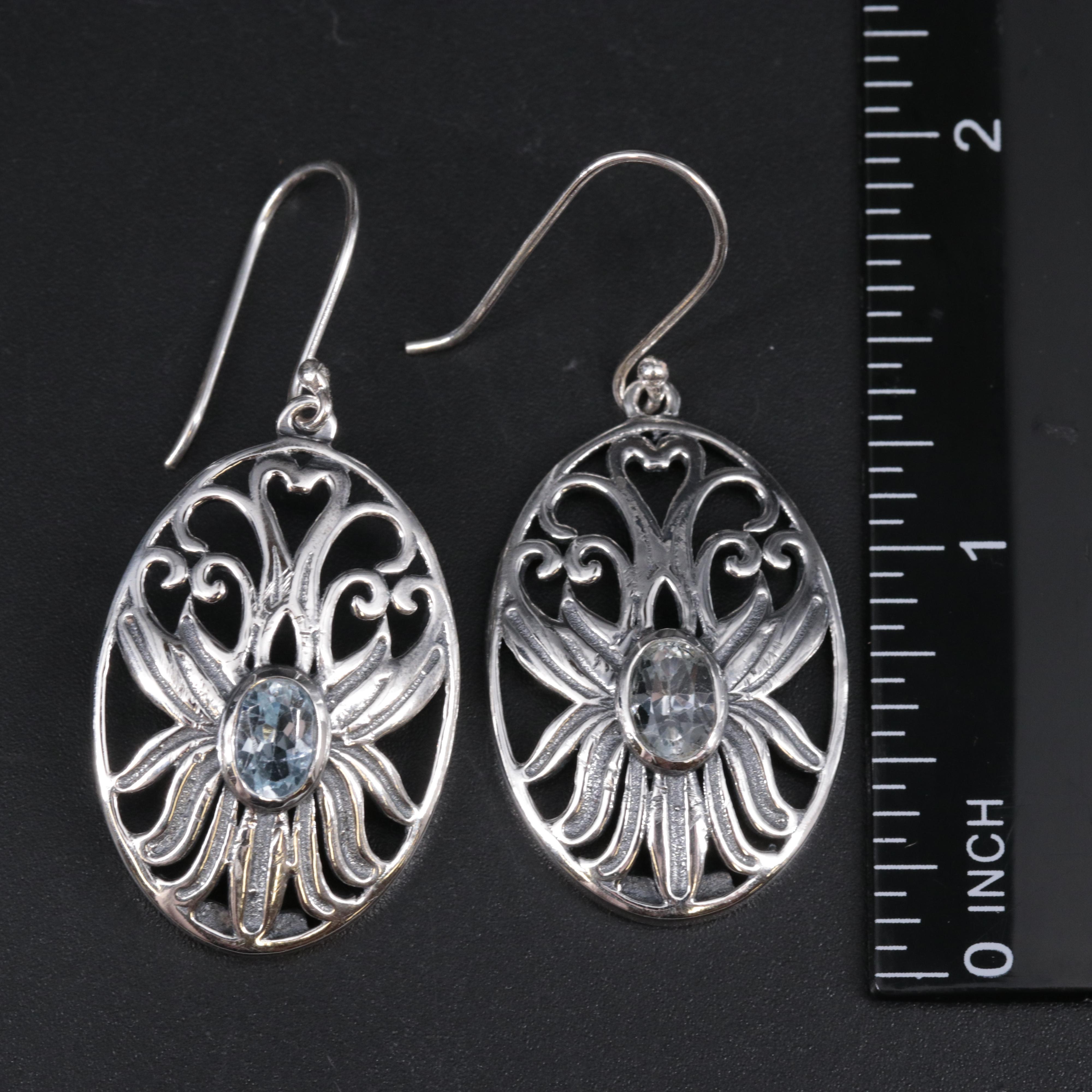 Sterling Silver Earrings Including Blue Topaz
