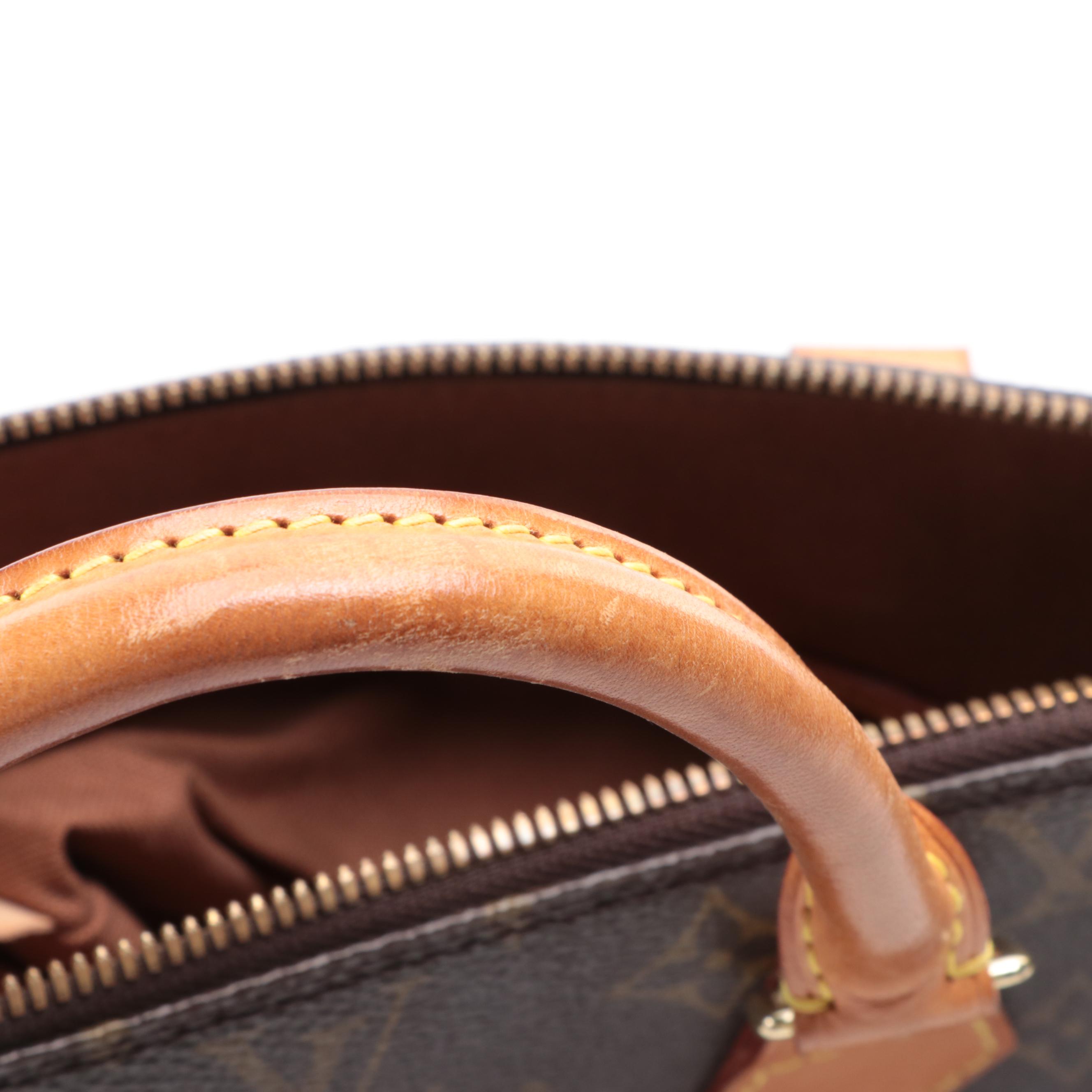 Louis Vuitton Alma PM Satchel in Monogram Canvas and Vachetta Leather