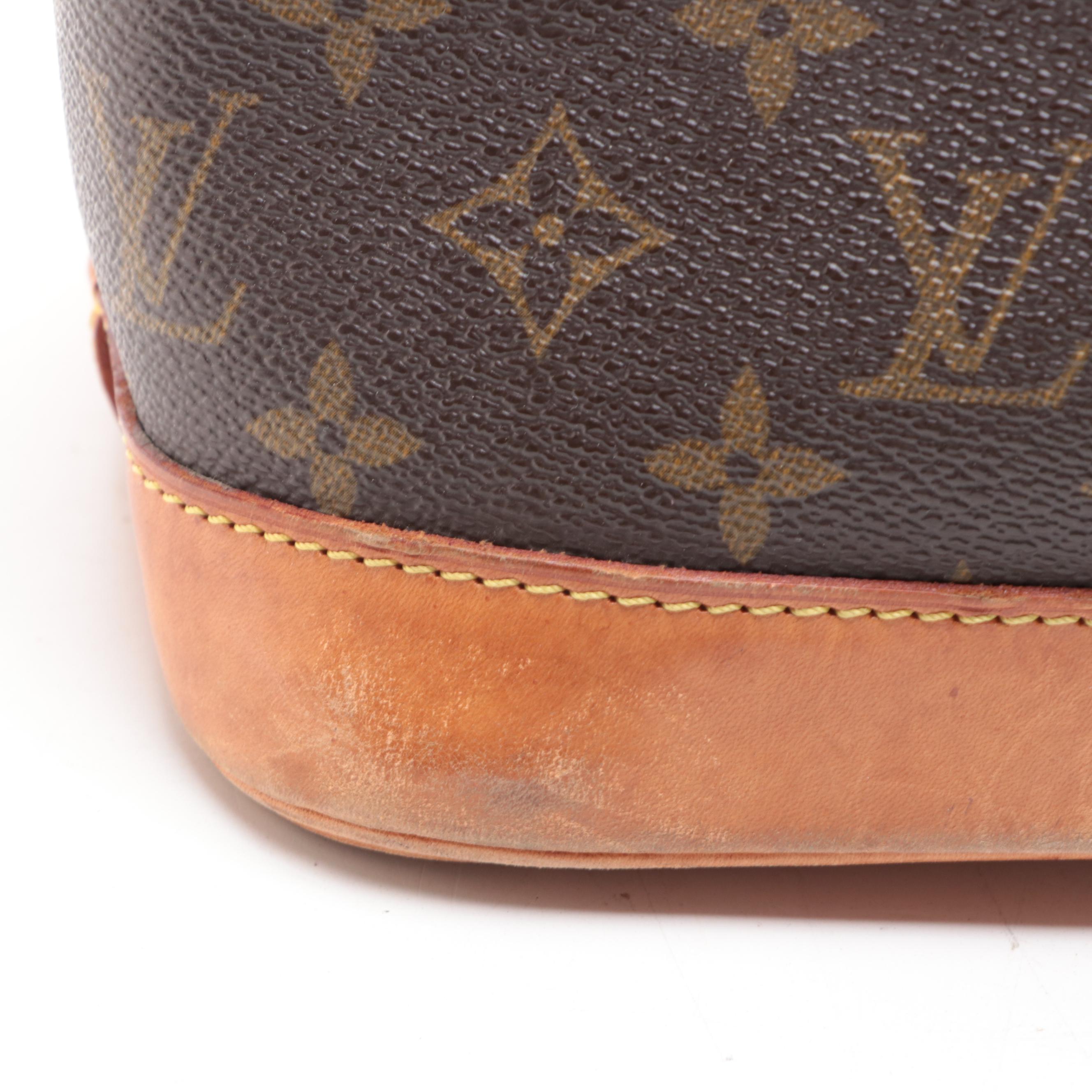 Louis Vuitton Alma PM Satchel in Monogram Canvas and Vachetta Leather