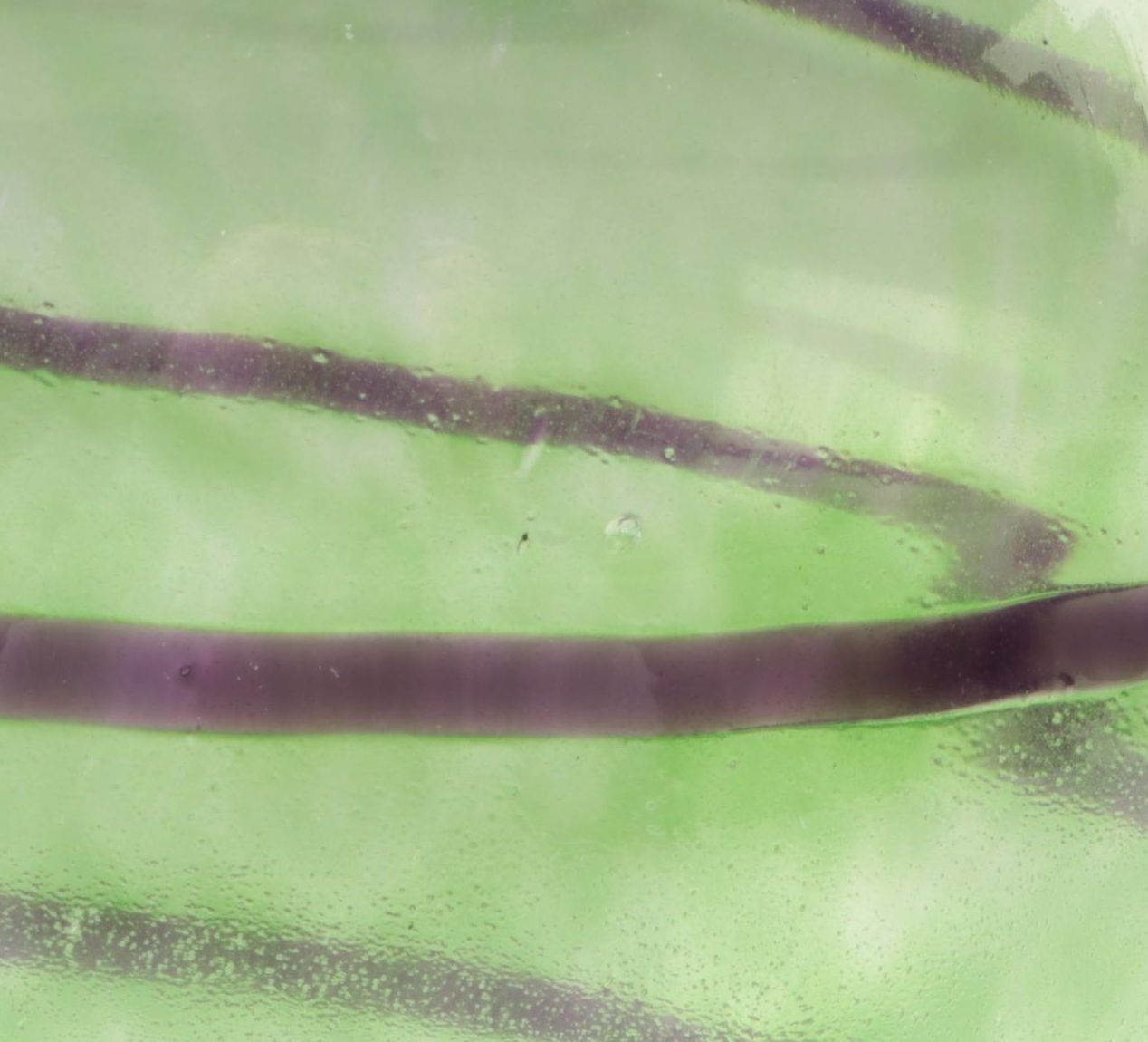 Gunnel Sahlin for Kosta Boda "Joy" Green Glass Bottle With Trailing, 1991