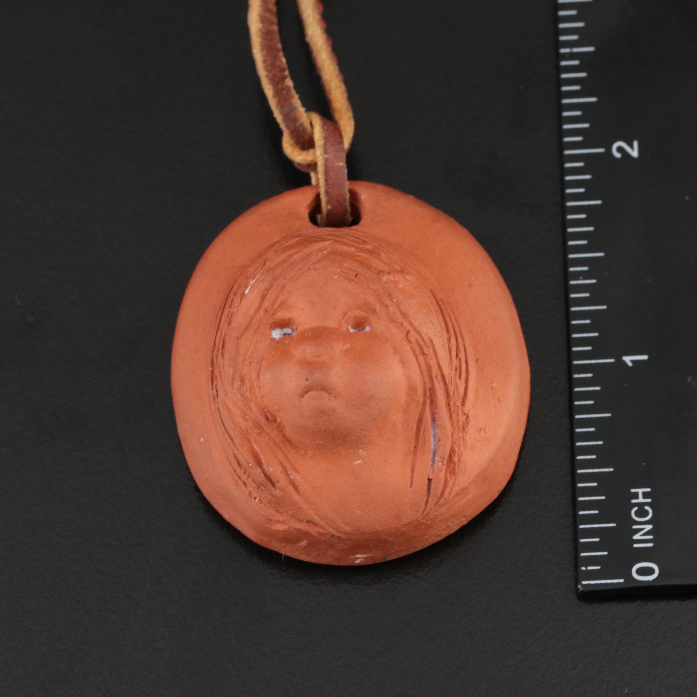 Ann Entis Sculpted Terracotta Boy and Girl Pendant Necklaces