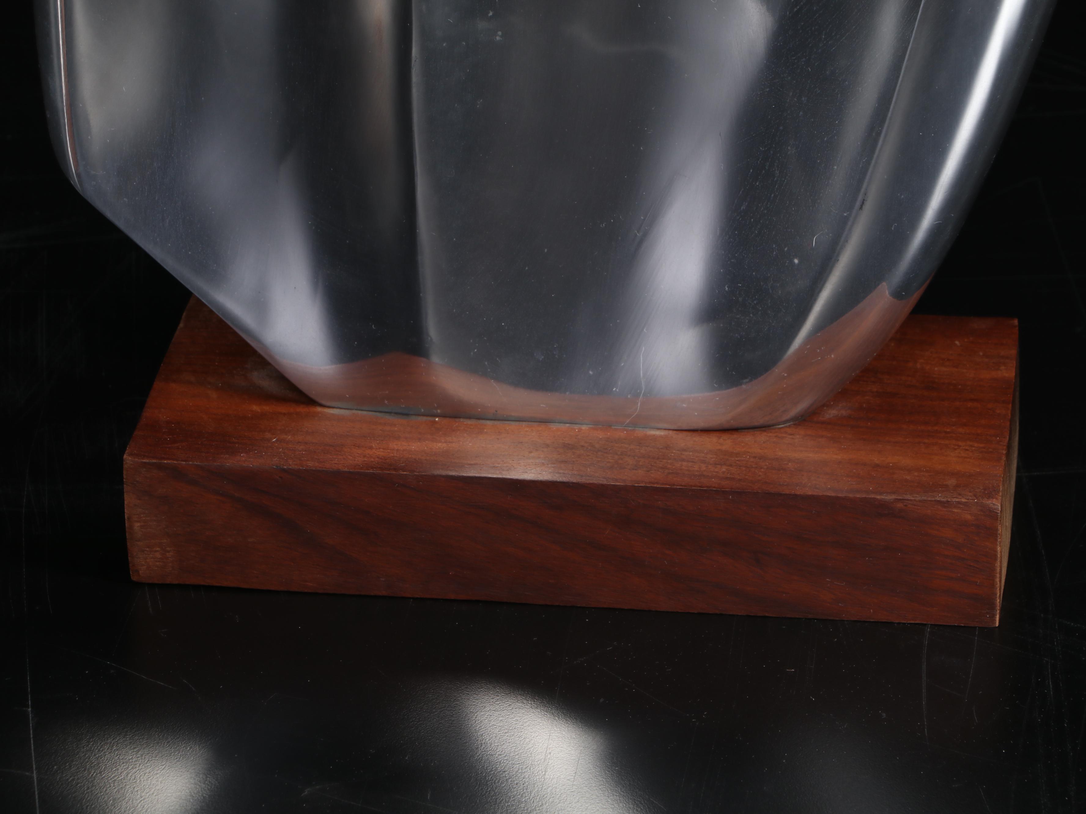 Pair of Polished Aluminum "Miro" Sculptures on Wood Blocks