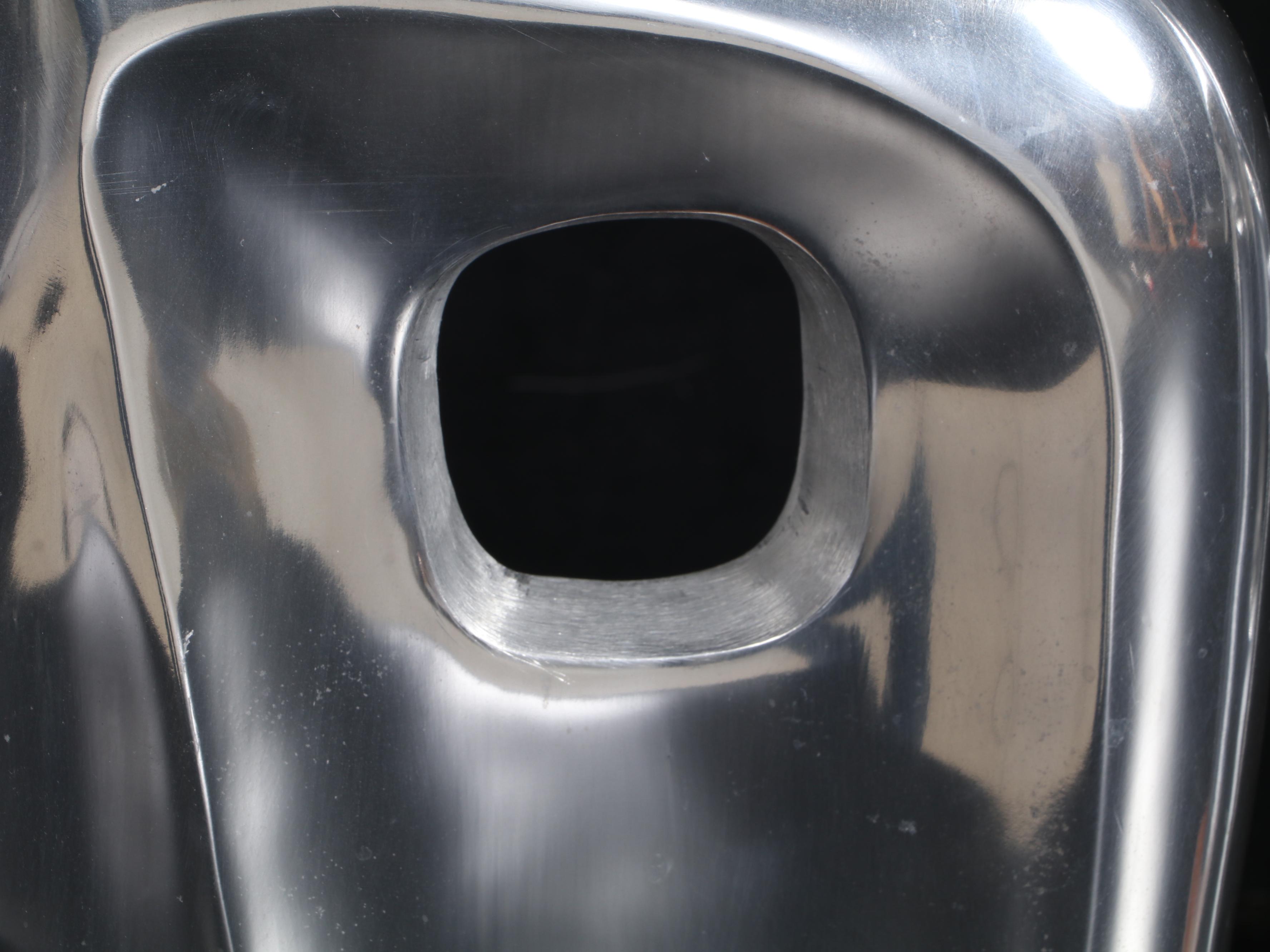 Pair of Polished Aluminum "Miro" Sculptures on Wood Blocks