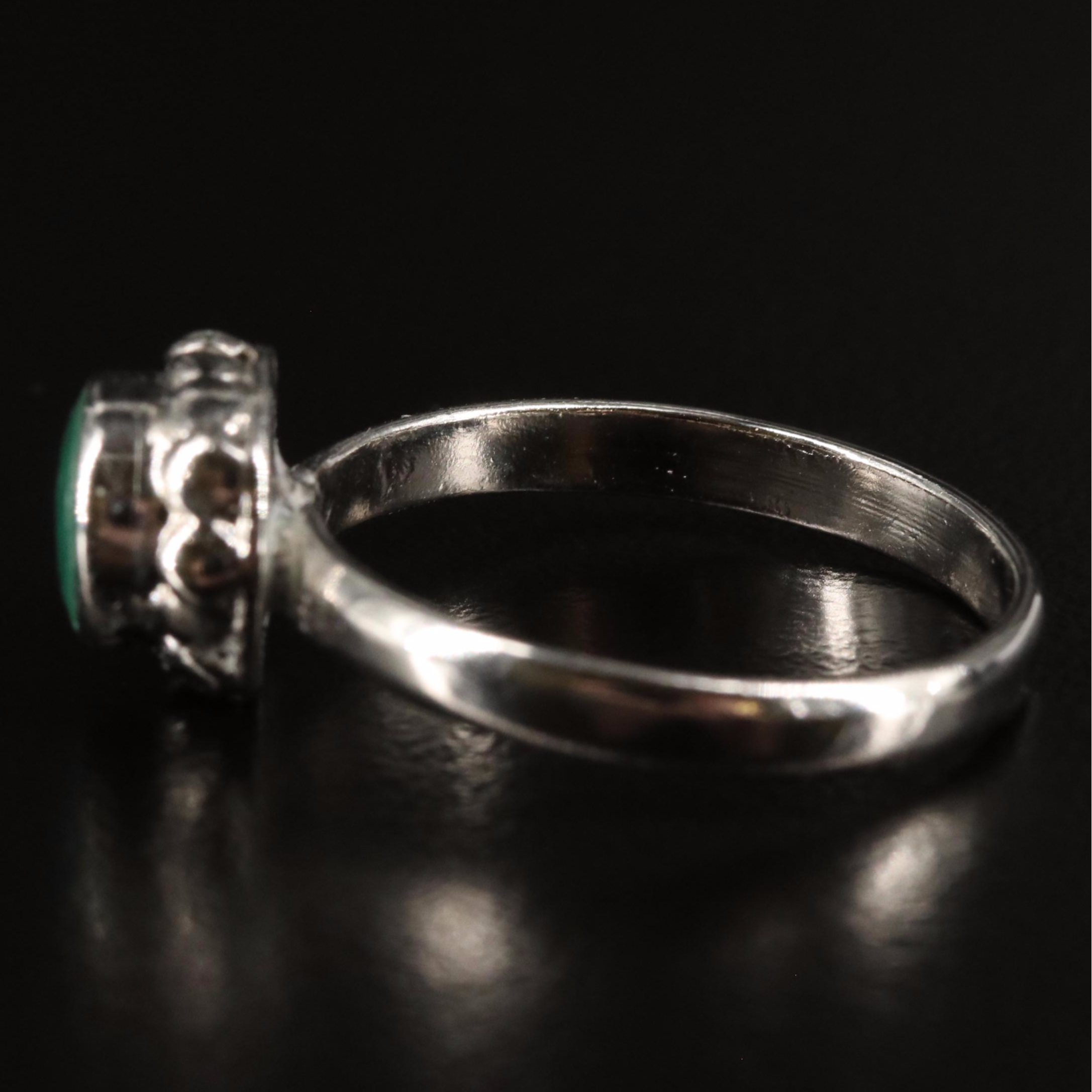 Emerald Solitaire Ring