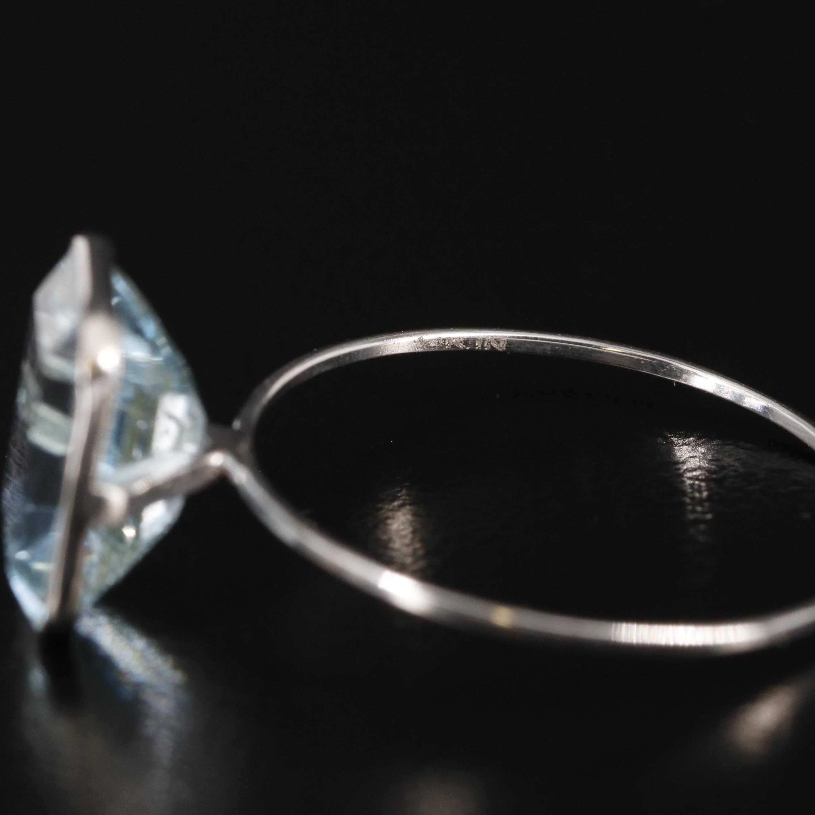 14K Blue Topaz Ring