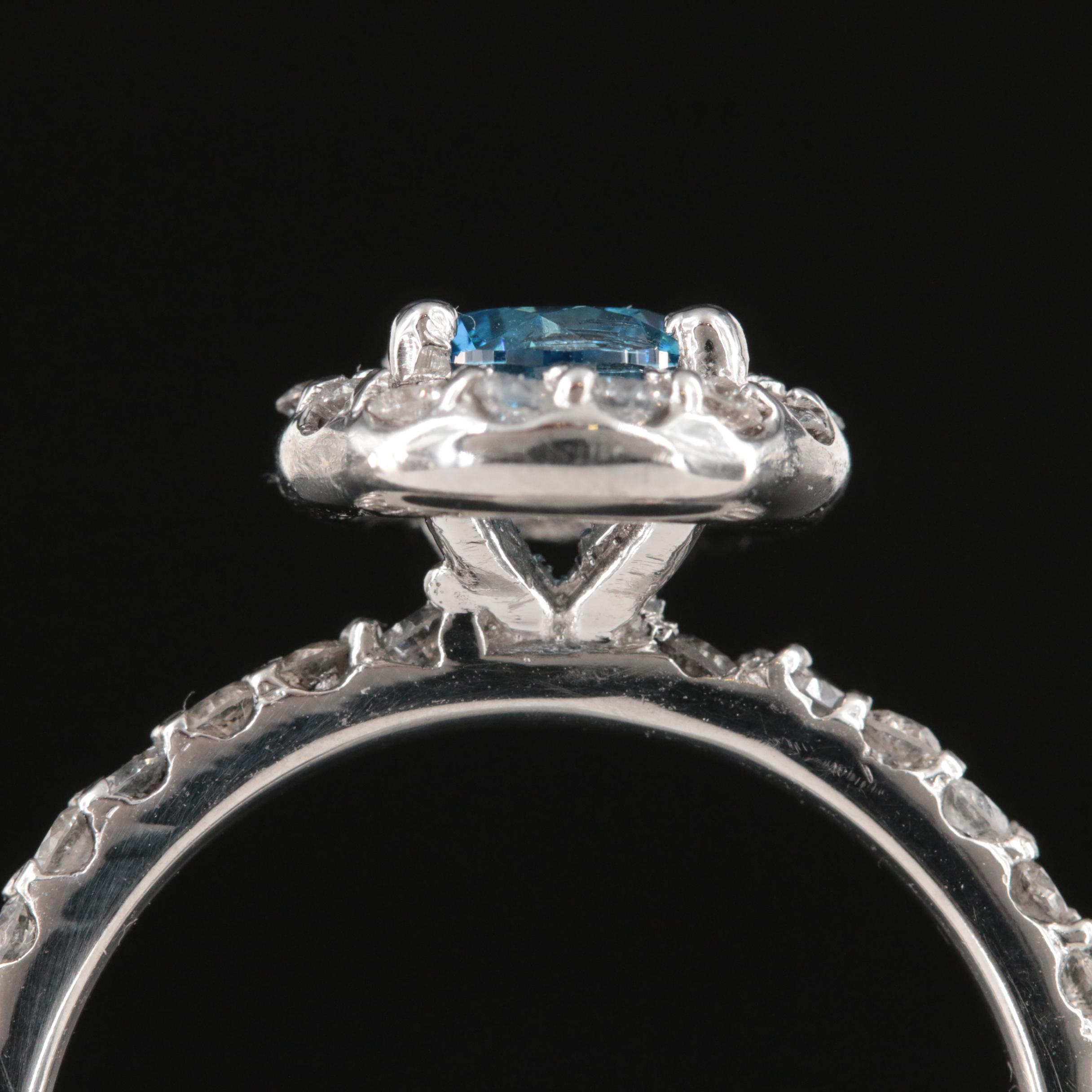 14K 1.75 CTW Diamond Halo Ring with Fancy Vivid Blue Center