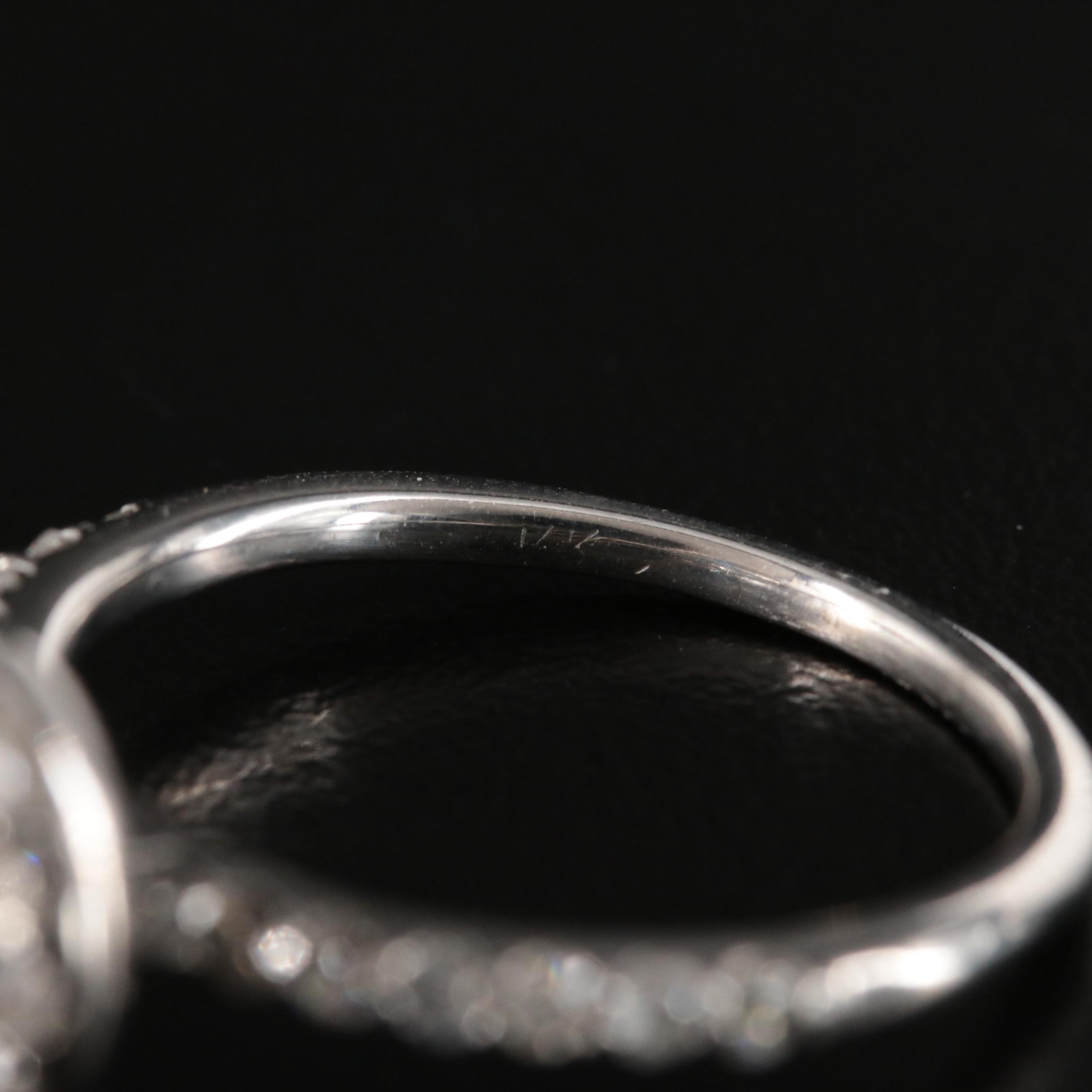 14K 1.75 CTW Diamond Halo Ring with Fancy Vivid Blue Center