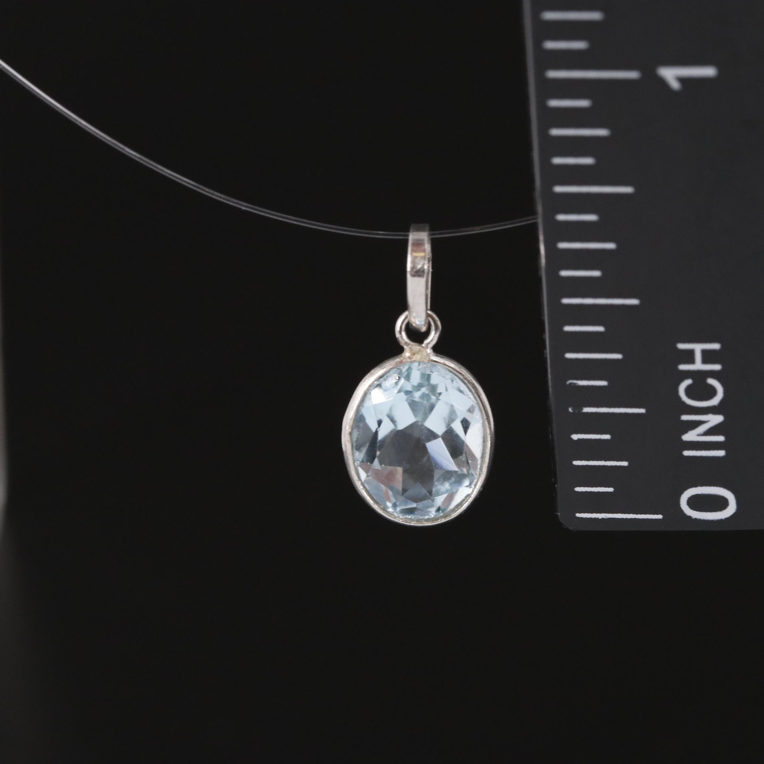 14K Blue Topaz Pendant