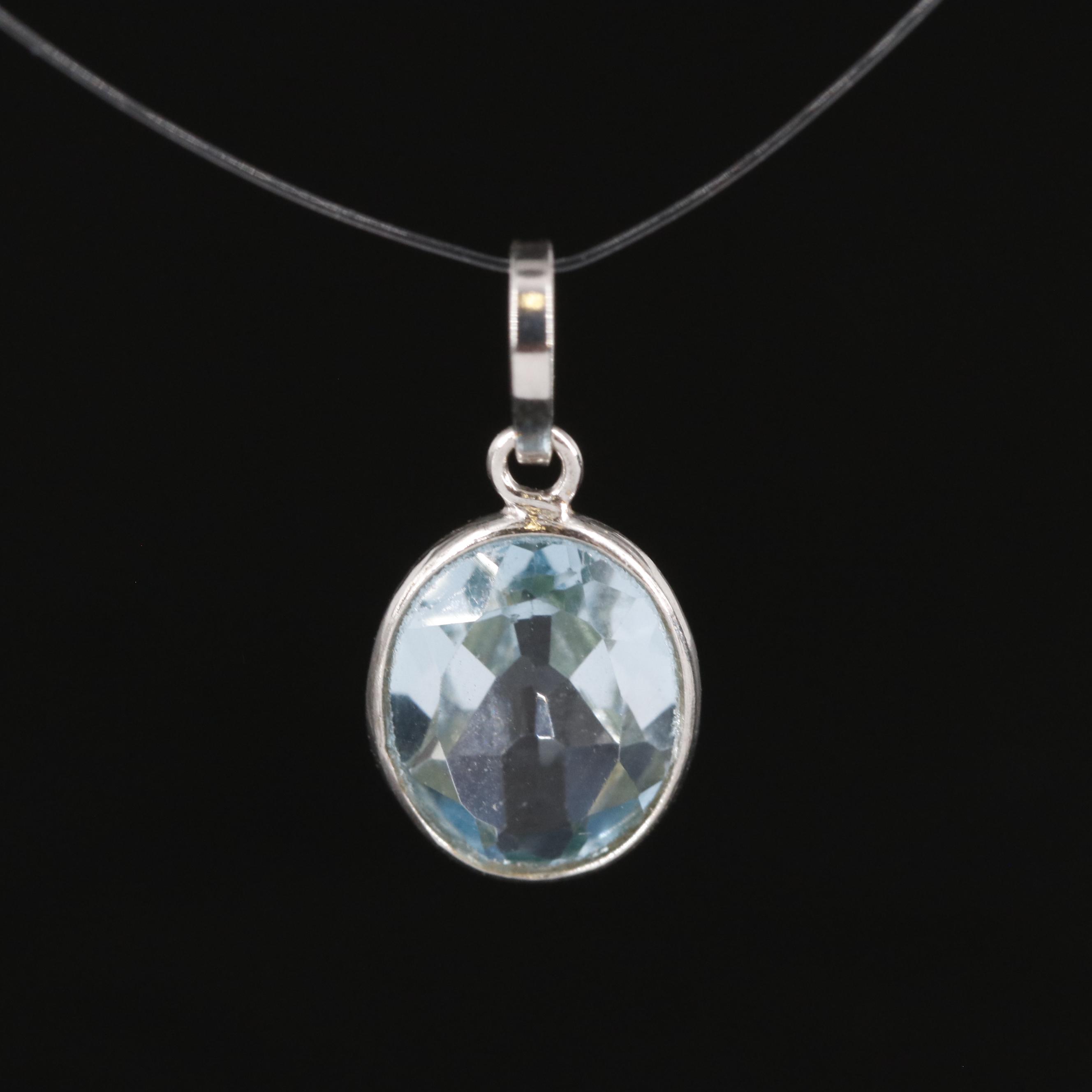 14K Blue Topaz Pendant