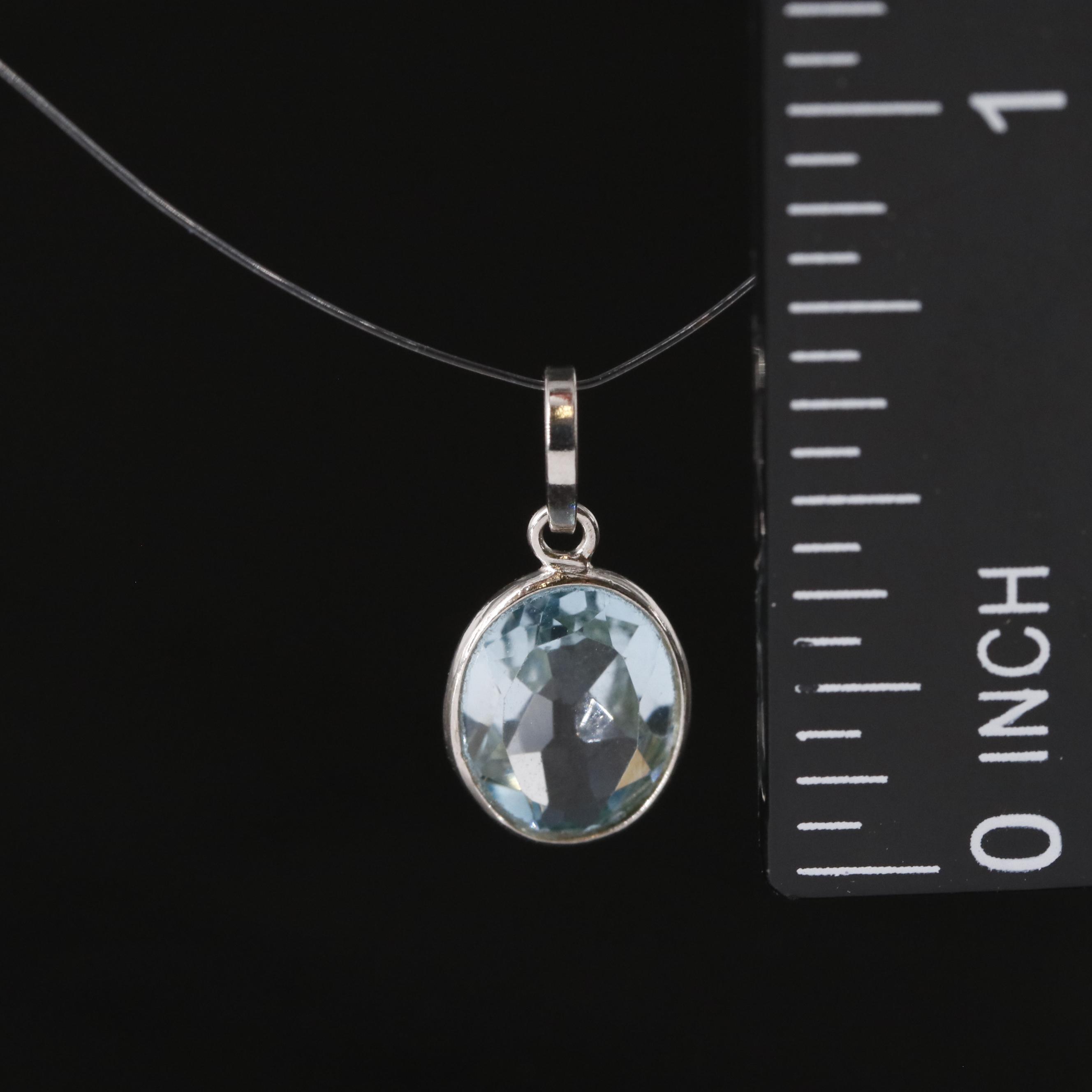 14K Blue Topaz Pendant