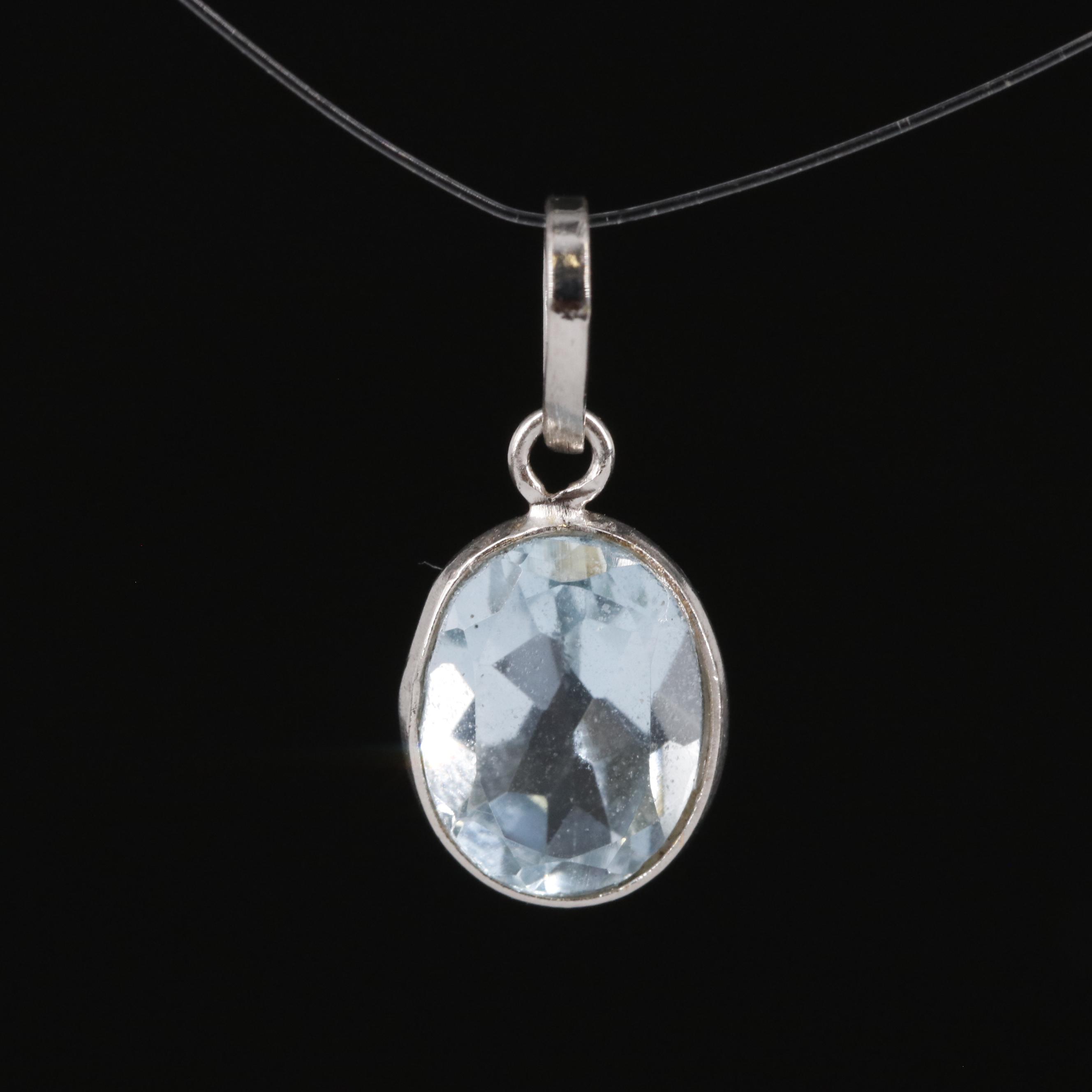 14K Blue Topaz Pendant