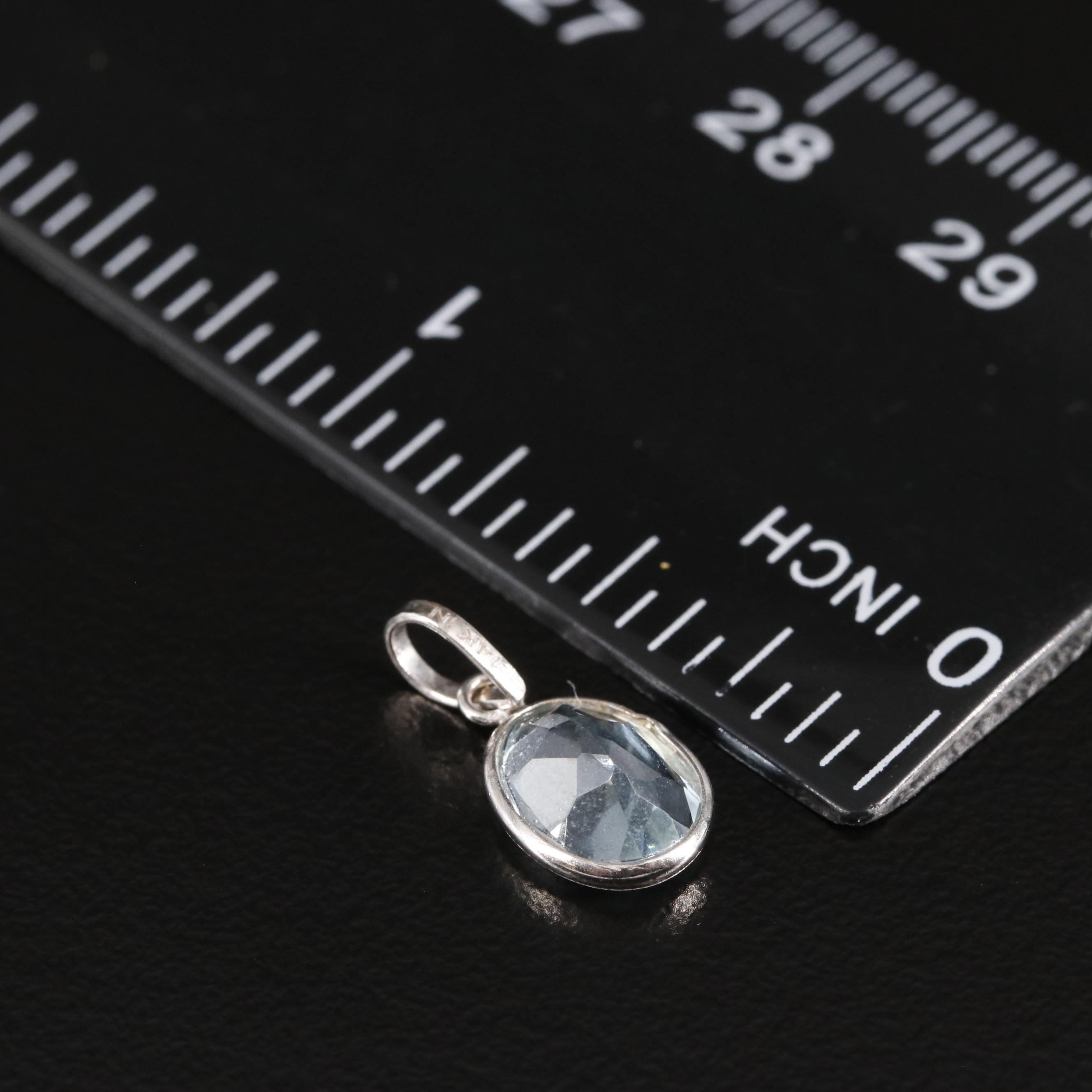 14K Blue Topaz Pendant