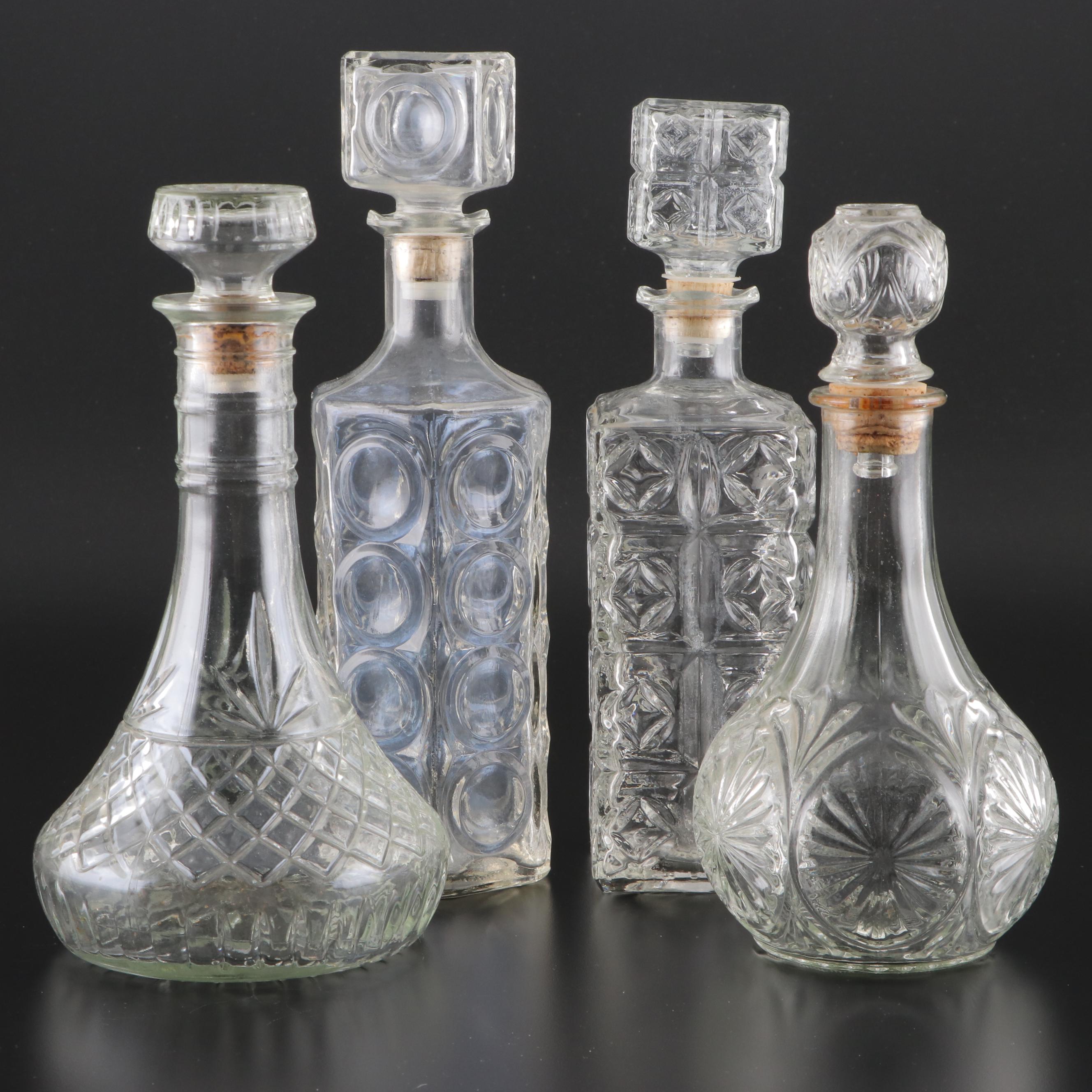 Anchor Hocking Star and Cameo Medallion and Other Pressed Glass Decanters