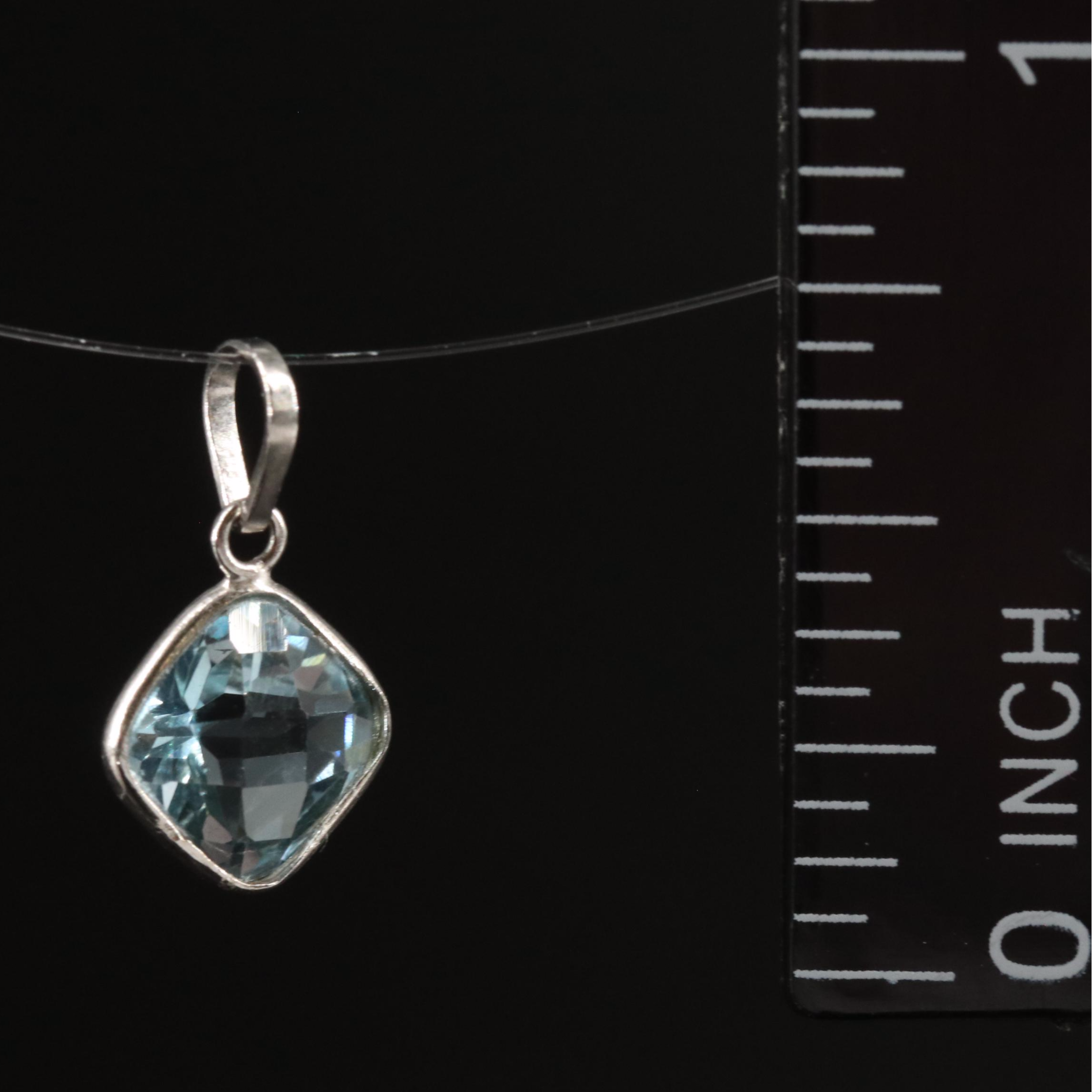 14K Blue Topaz Pendant