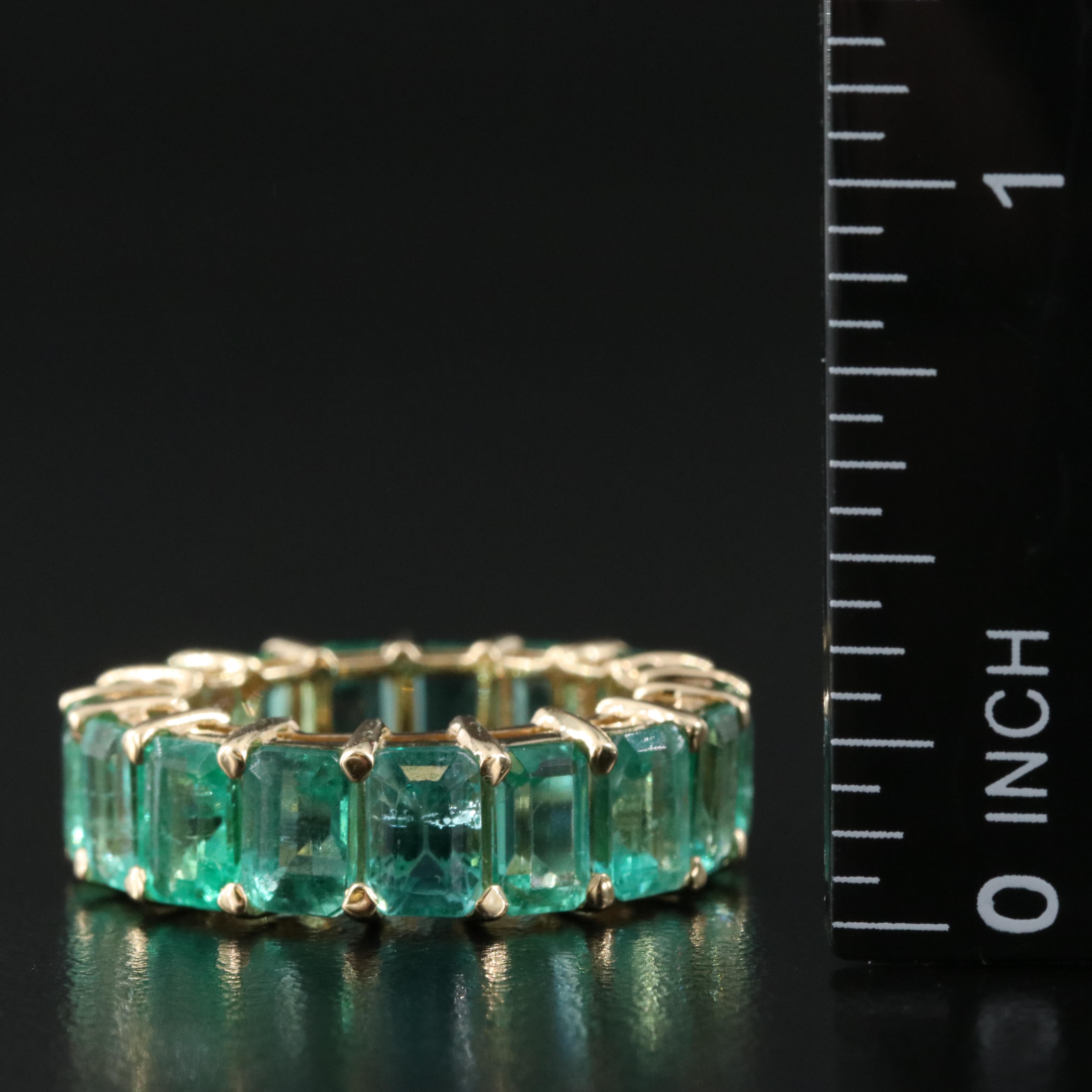 18K 9.95 CTW Emerald Eternity Band