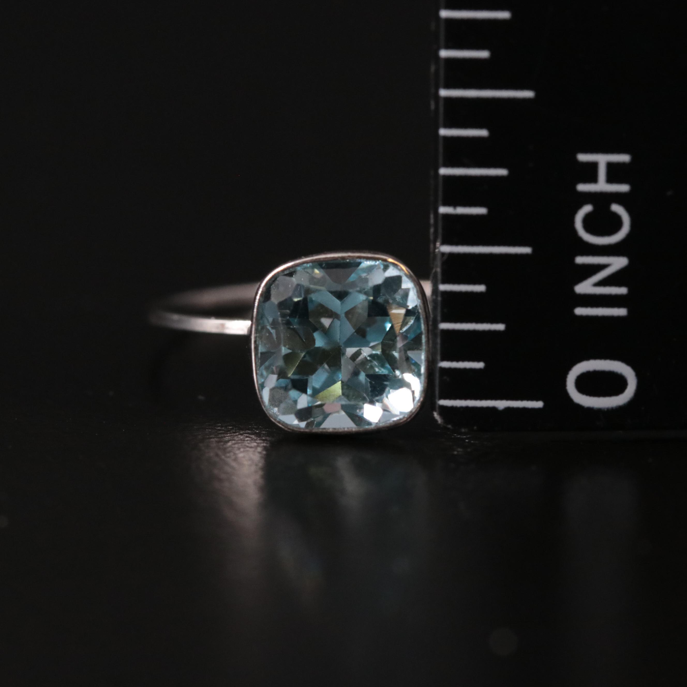 14K Blue Topaz Solitaire Ring