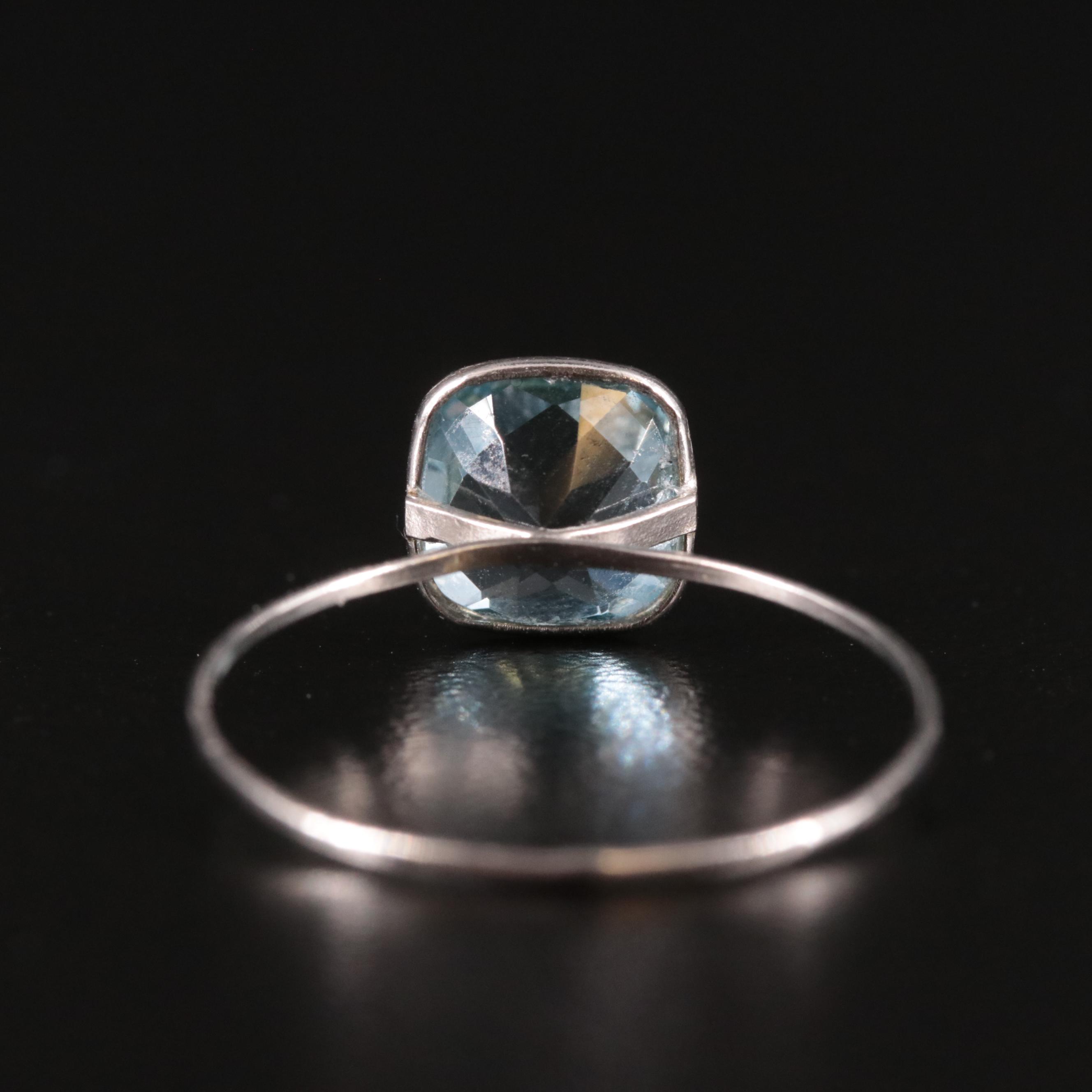 14K Blue Topaz Solitaire Ring