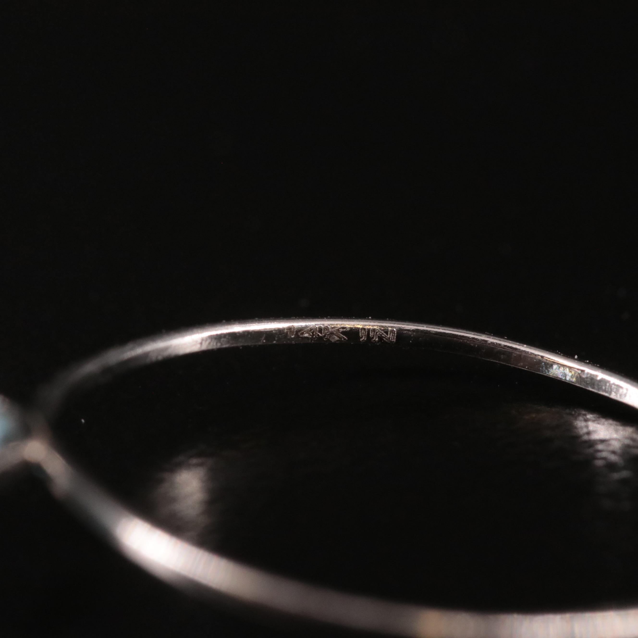 14K Blue Topaz Solitaire Ring