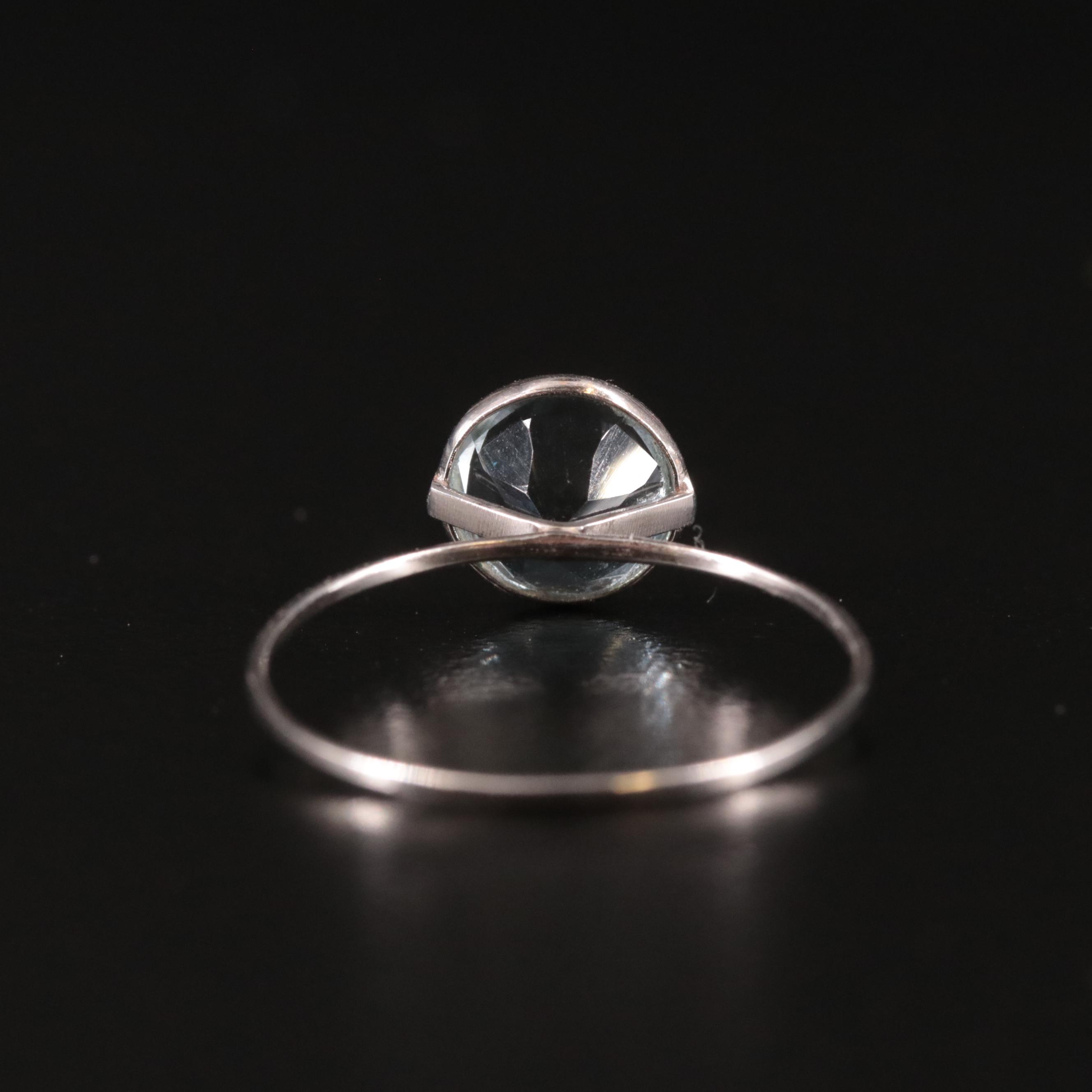 14K Blue Topaz Solitaire Ring