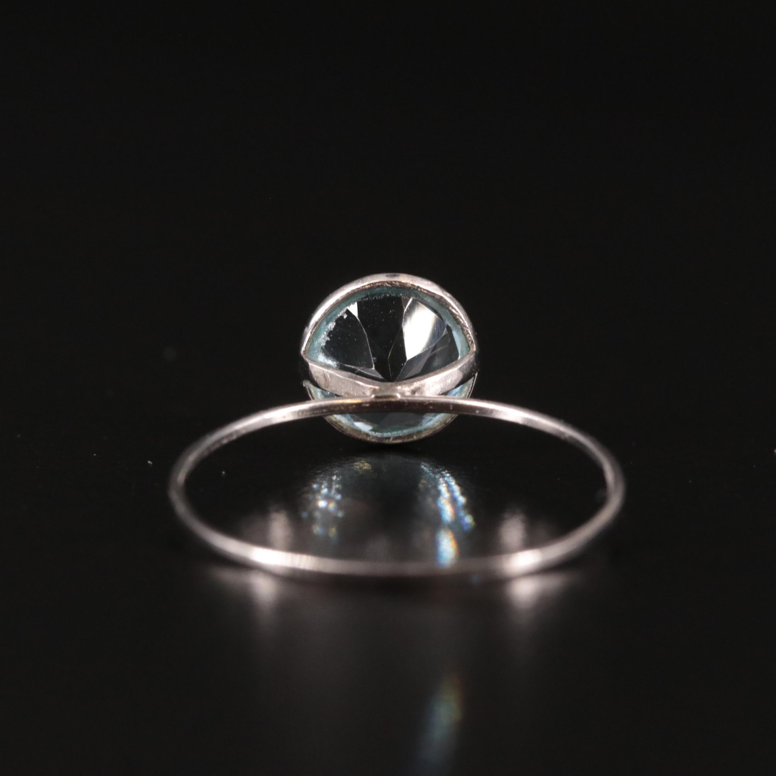 14K Blue Topaz Solitaire Ring