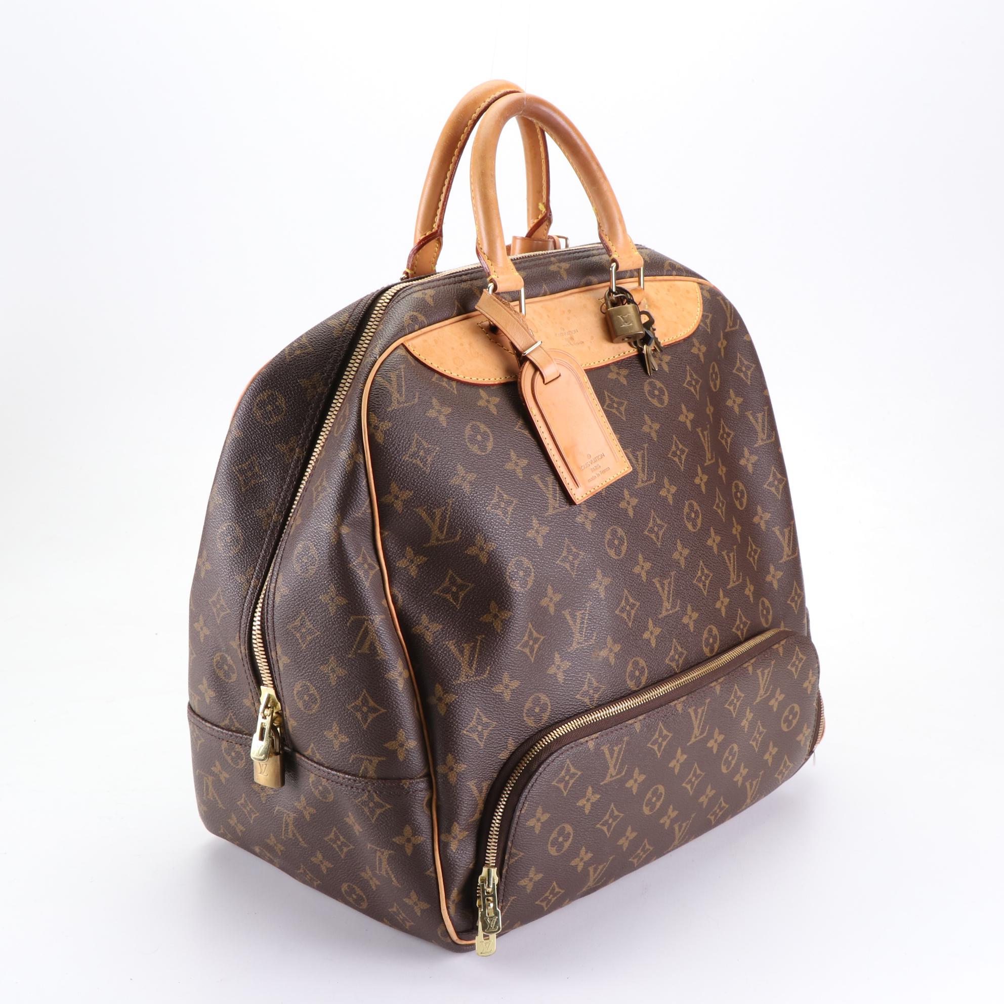 Louis Vuitton Evasion MM Travel Bag in Monogram Canvas and Vachetta Leather