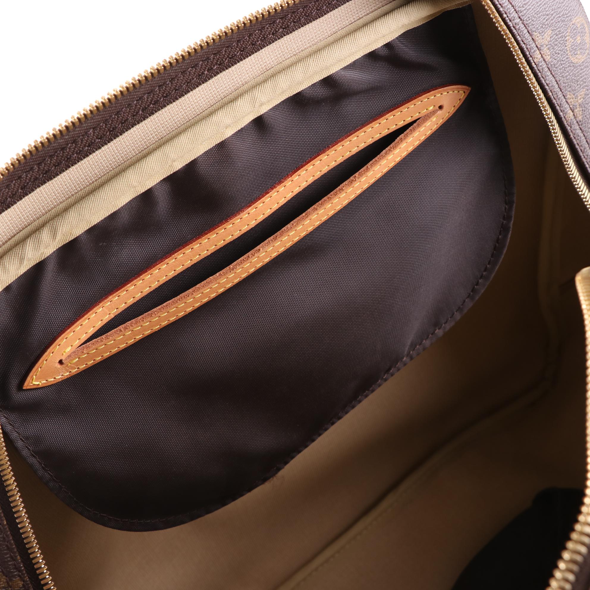 Louis Vuitton Evasion MM Travel Bag in Monogram Canvas and Vachetta Leather