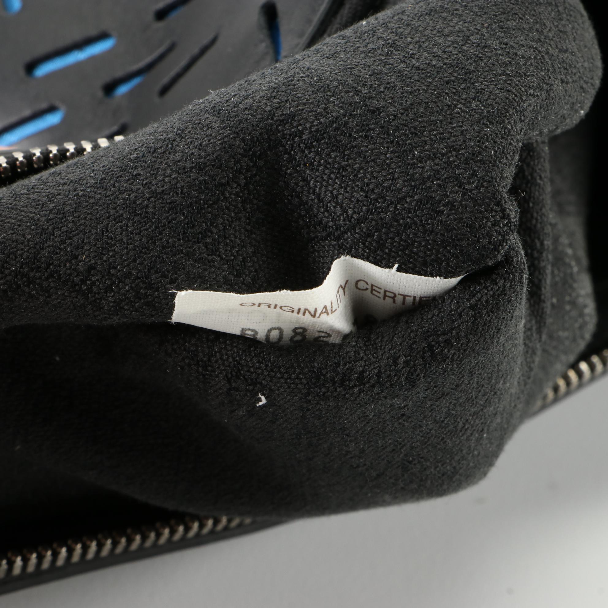 Bottega Veneta Flat Wristlet Clutch in Laser Cut Leather