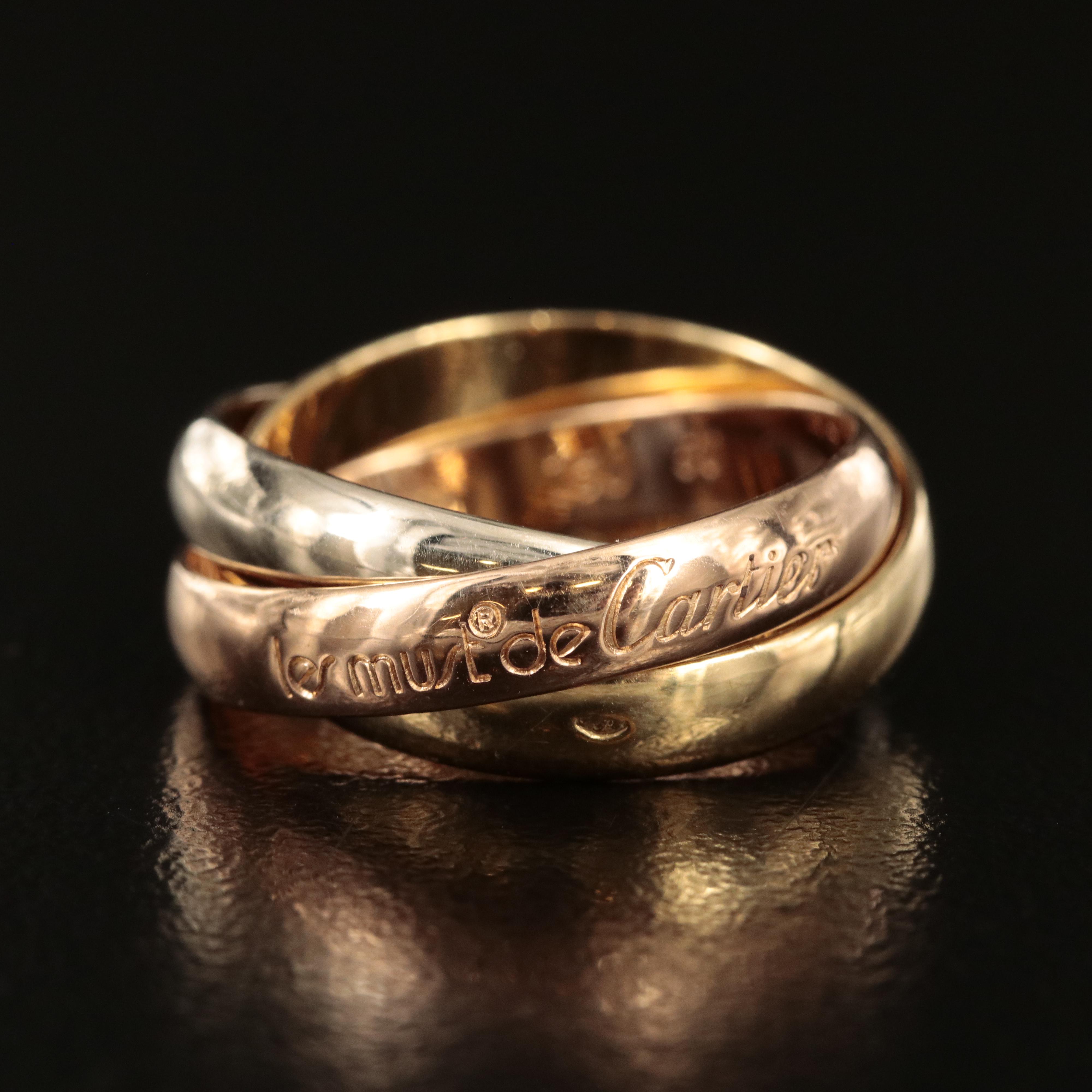 Cartier "Les de Must" Trinity 18K Tri-Color Gold Rolling Ring