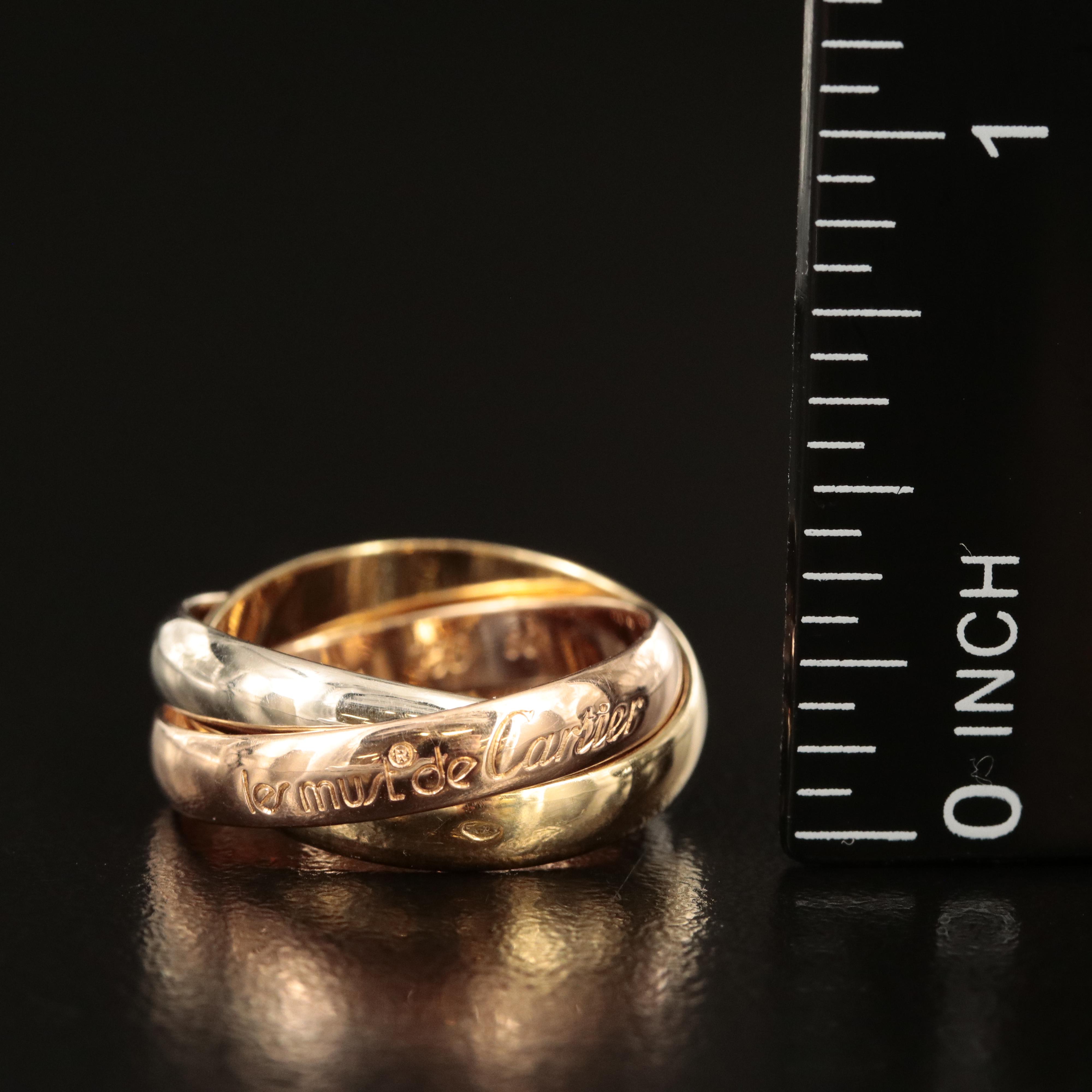 Cartier "Les de Must" Trinity 18K Tri-Color Gold Rolling Ring