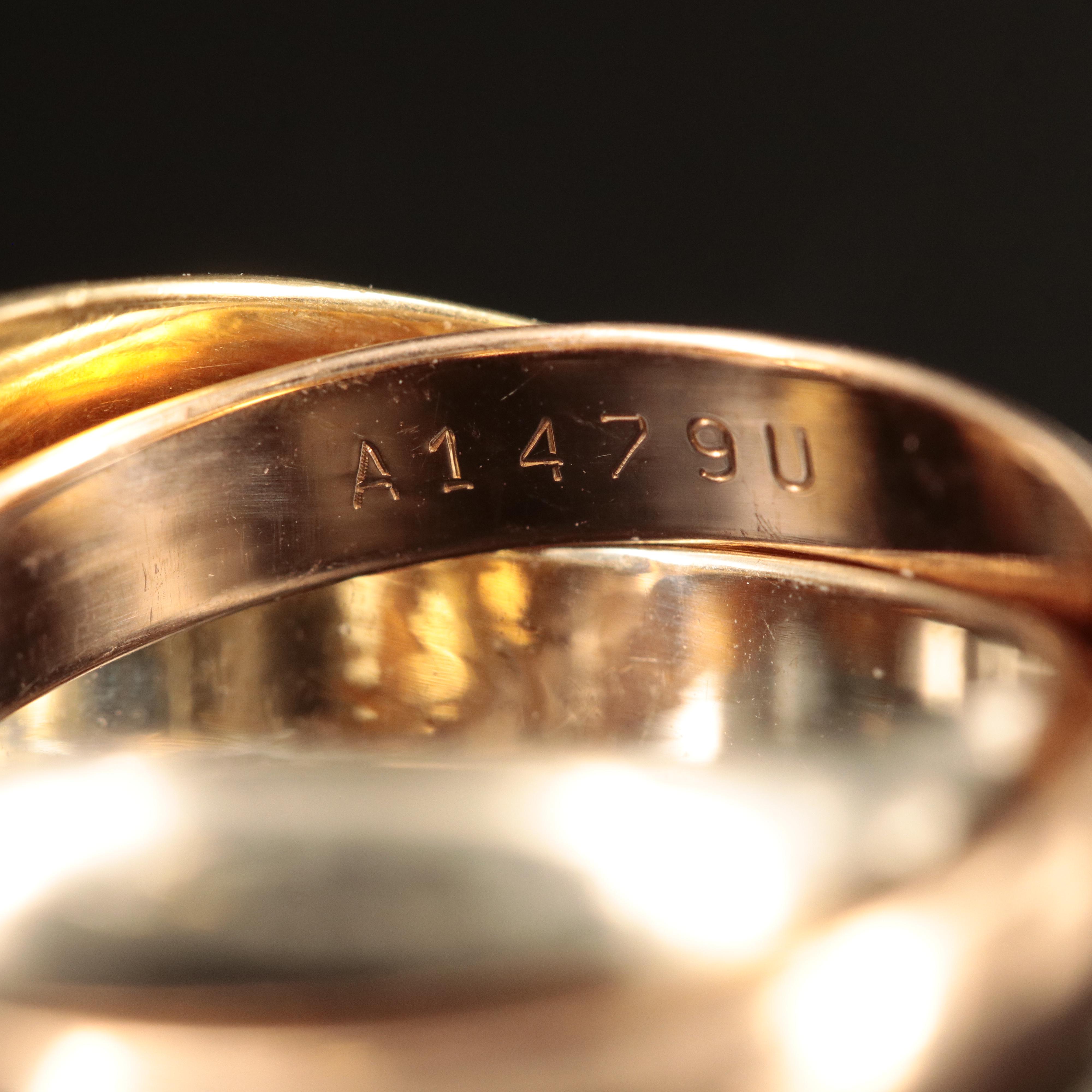 Cartier "Les de Must" Trinity 18K Tri-Color Gold Rolling Ring