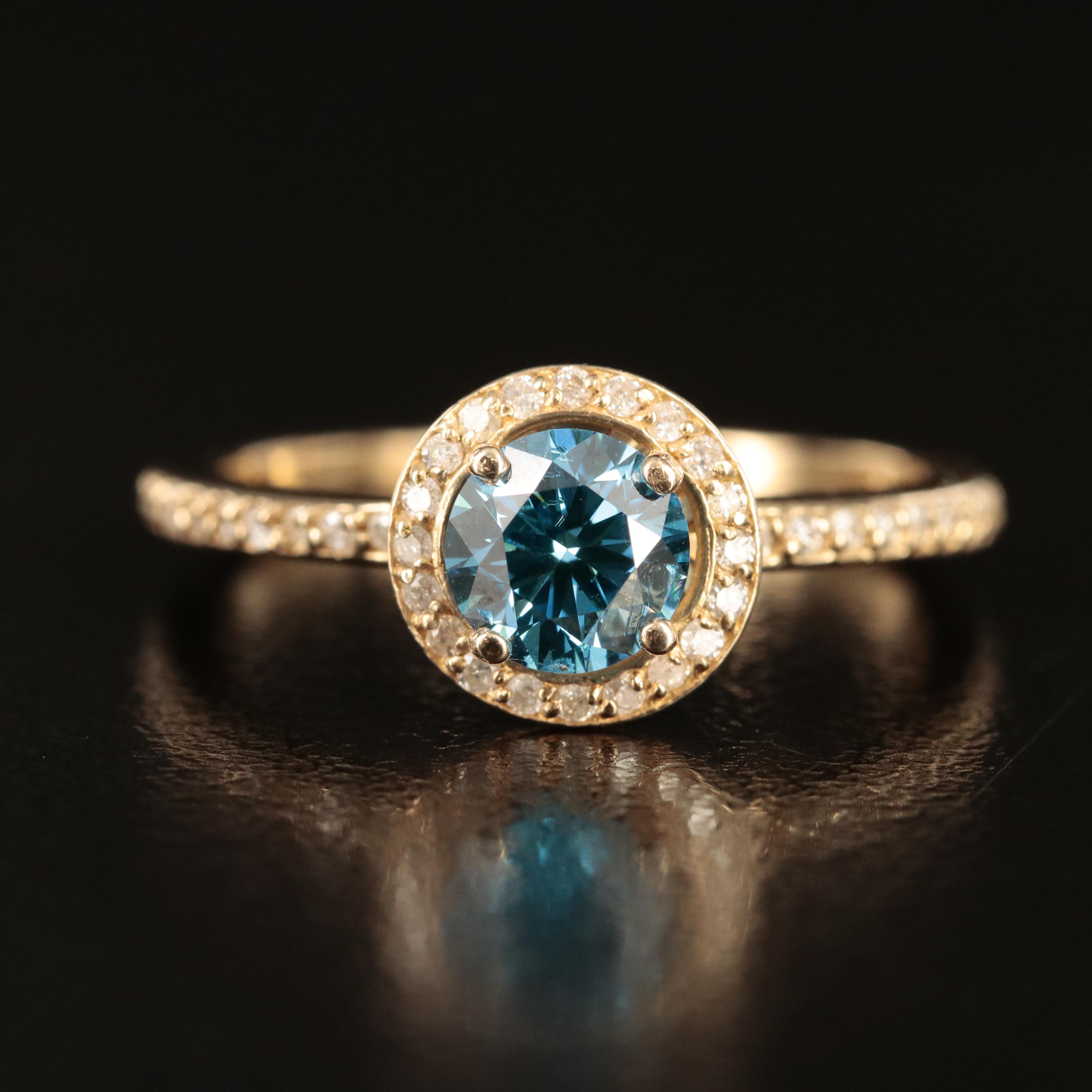 14K 1.01 CTW Diamond Halo Ring with Fancy Intense Blue Center