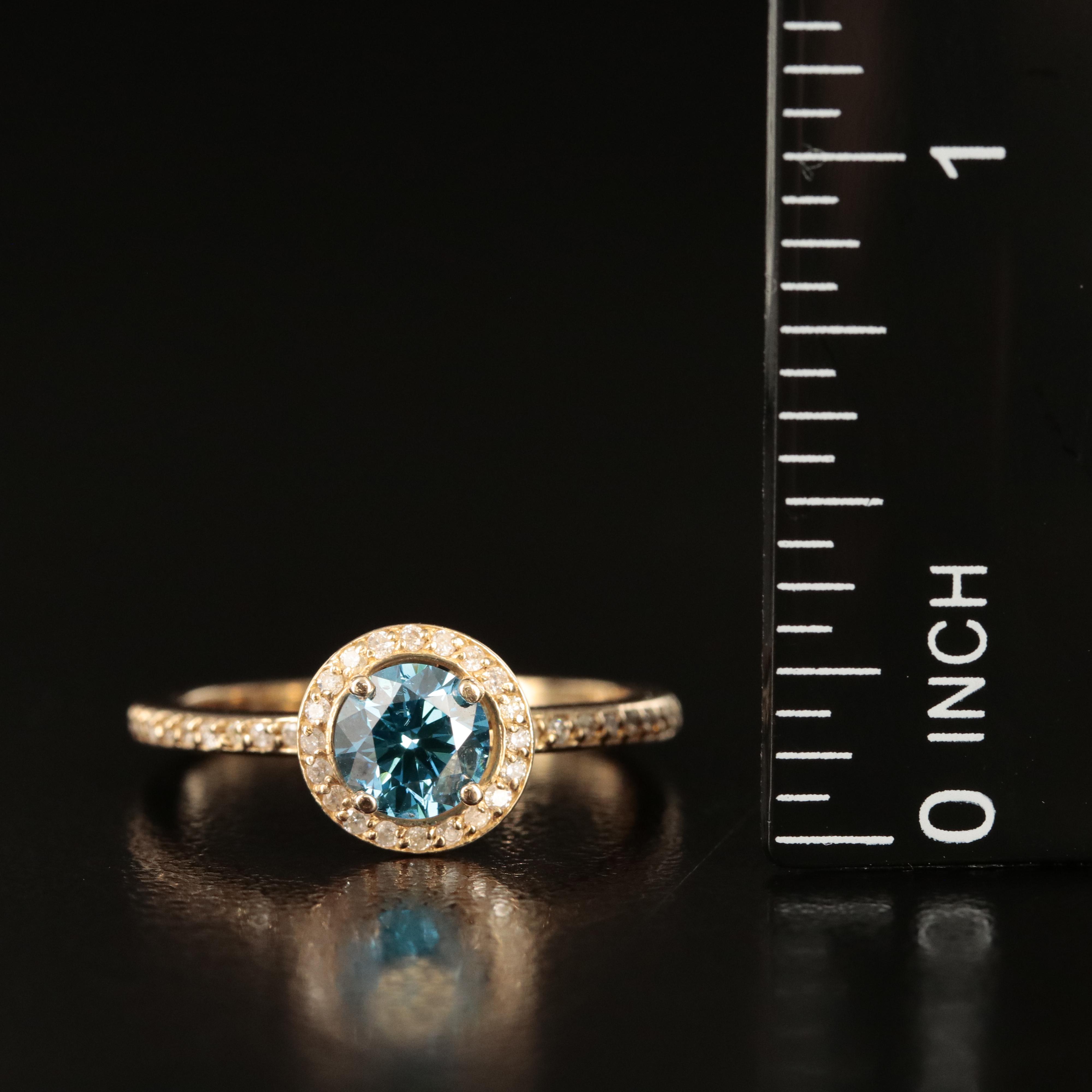 14K 1.01 CTW Diamond Halo Ring with Fancy Intense Blue Center