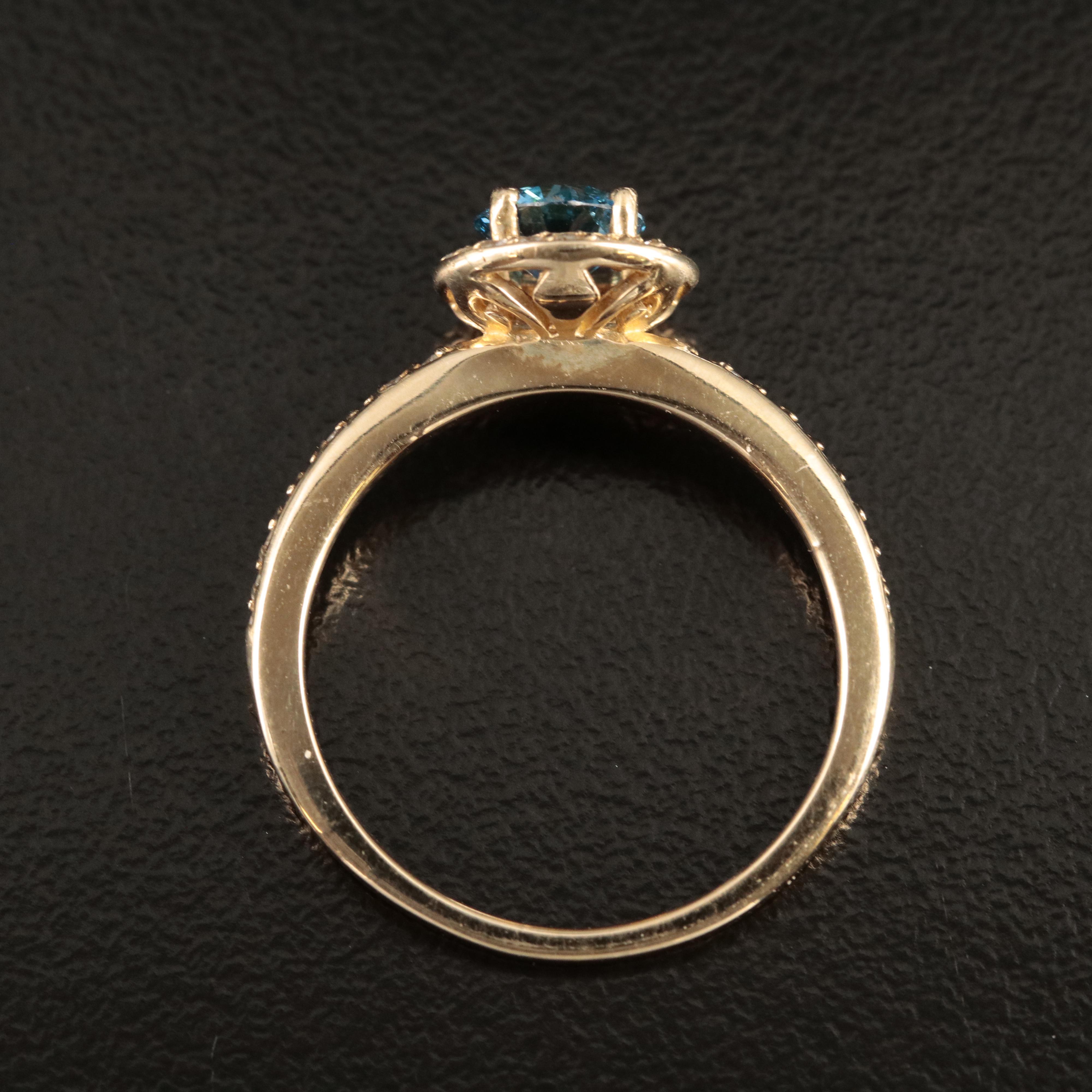 14K 1.01 CTW Diamond Halo Ring with Fancy Intense Blue Center