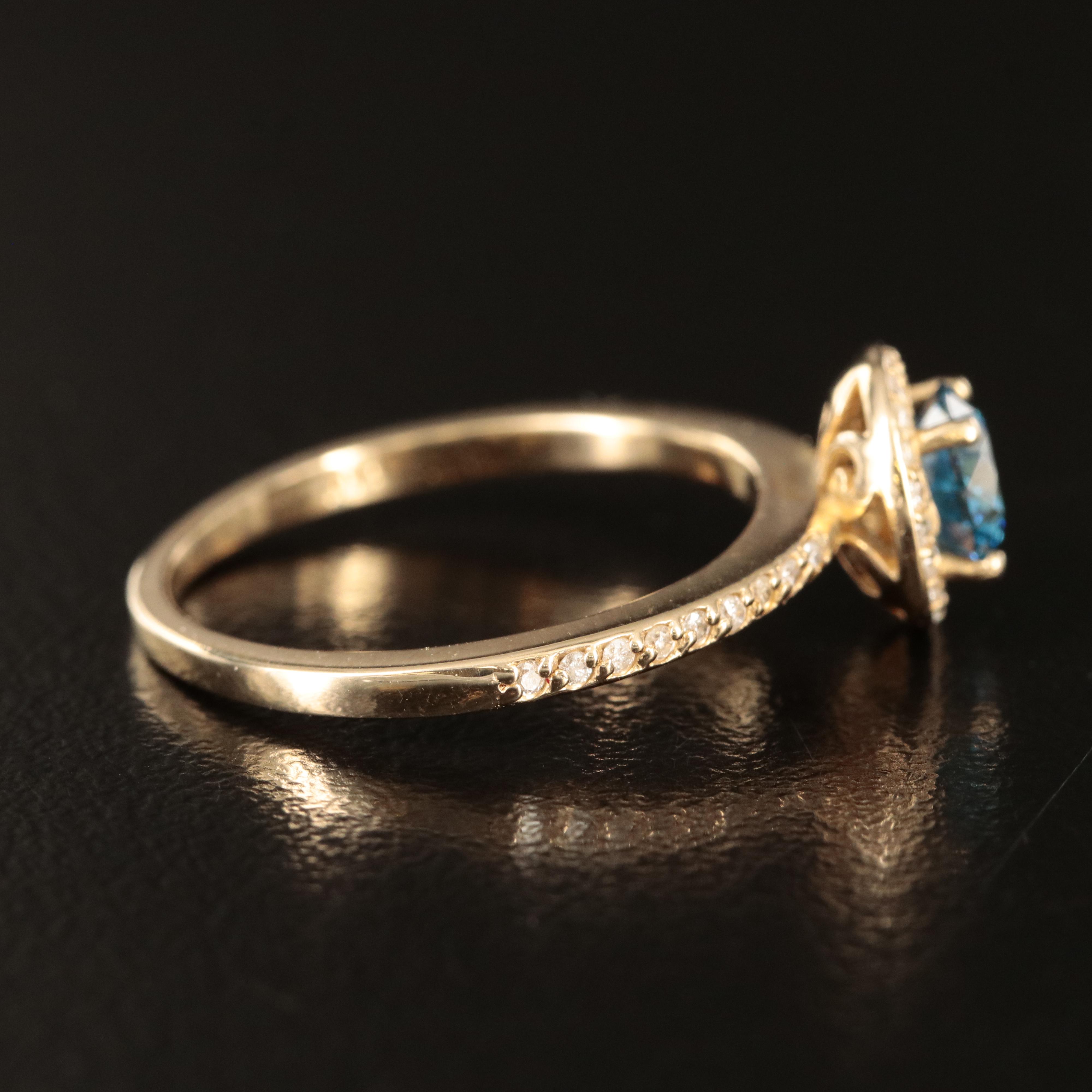 14K 1.01 CTW Diamond Halo Ring with Fancy Intense Blue Center