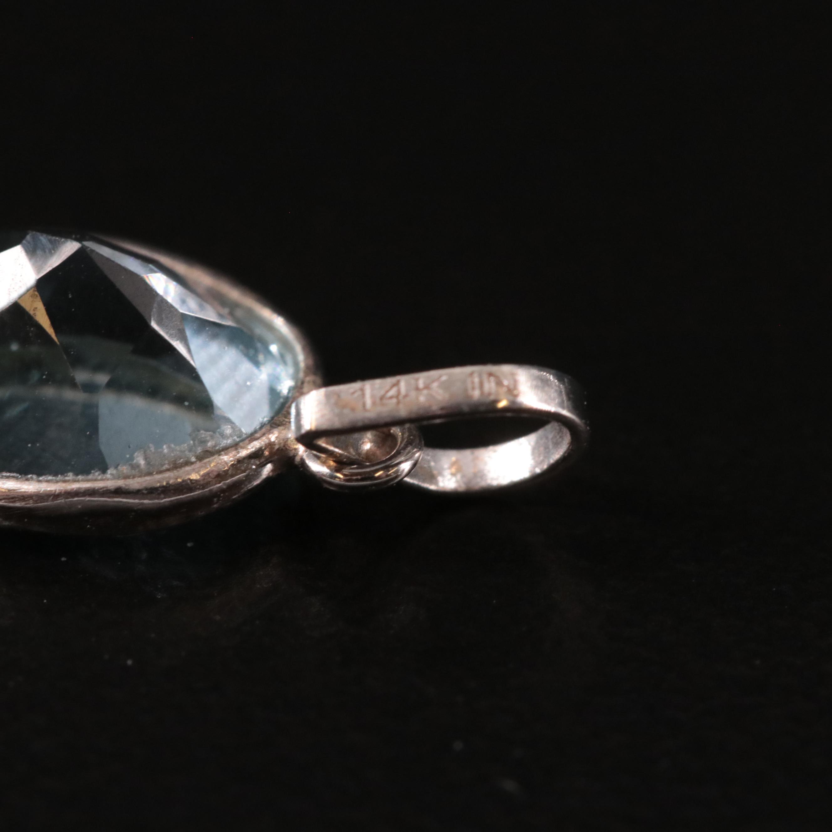 14K Blue Topaz Pendant