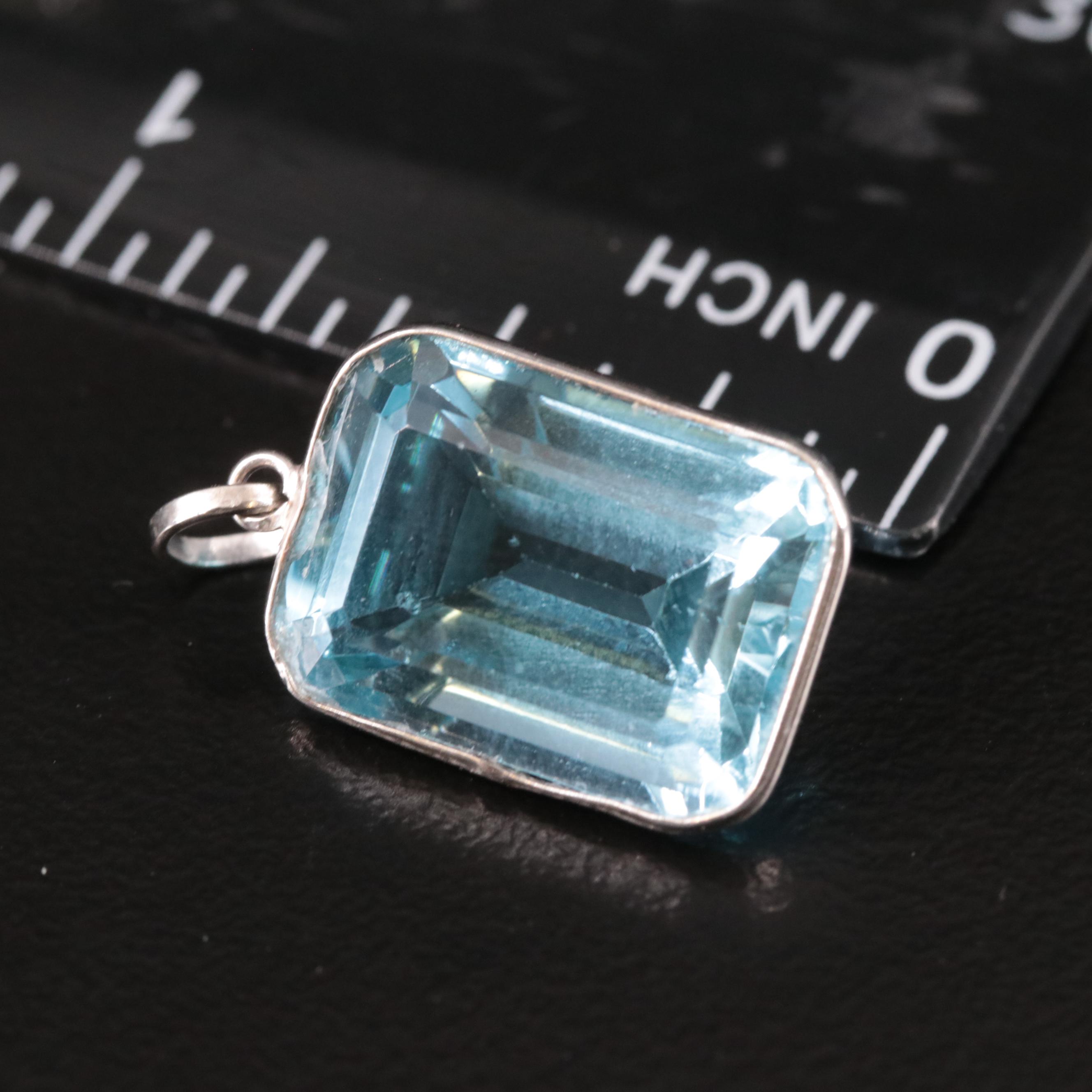 14K Blue Topaz Pendant