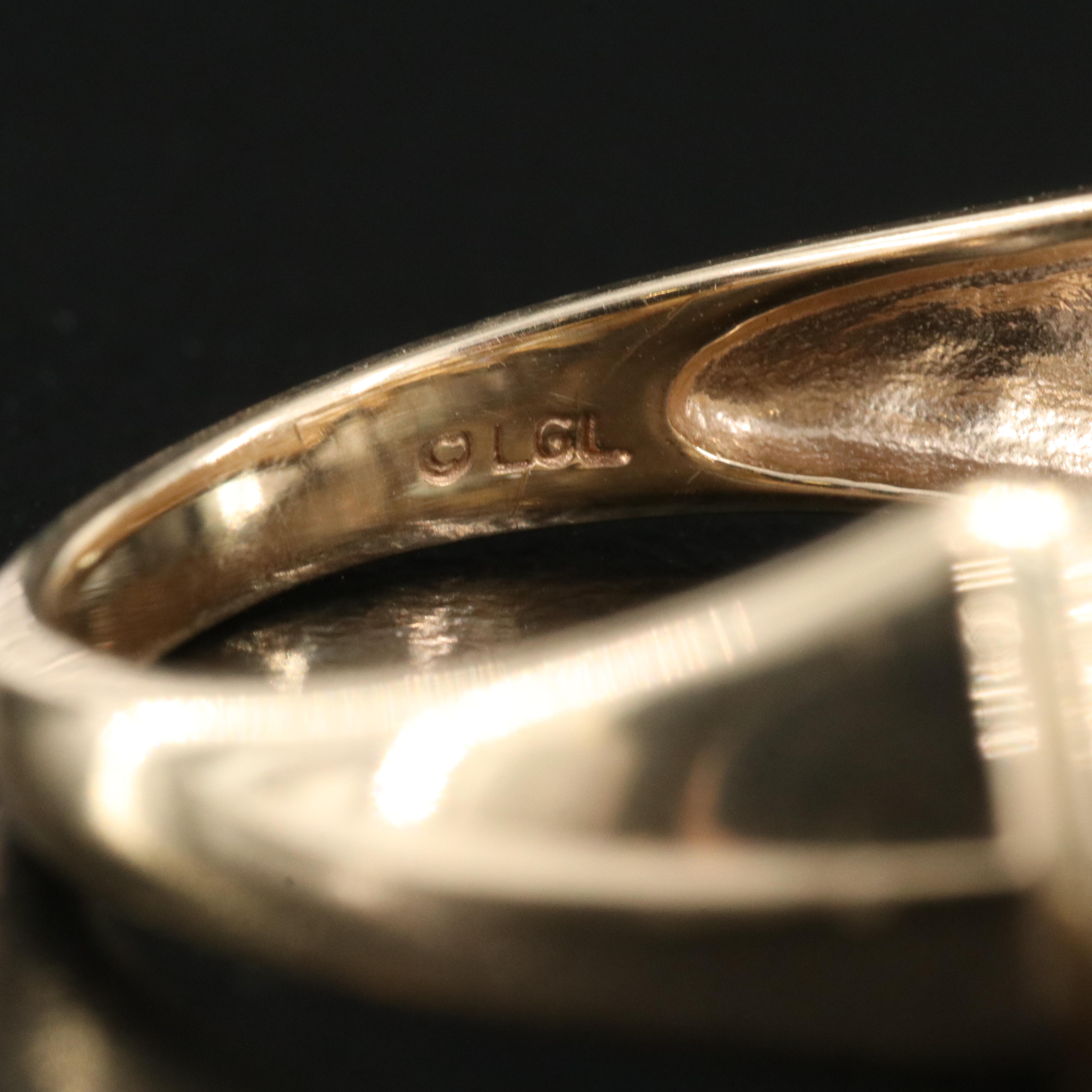 10K 1.68 CT Emerald and Diamond Ring