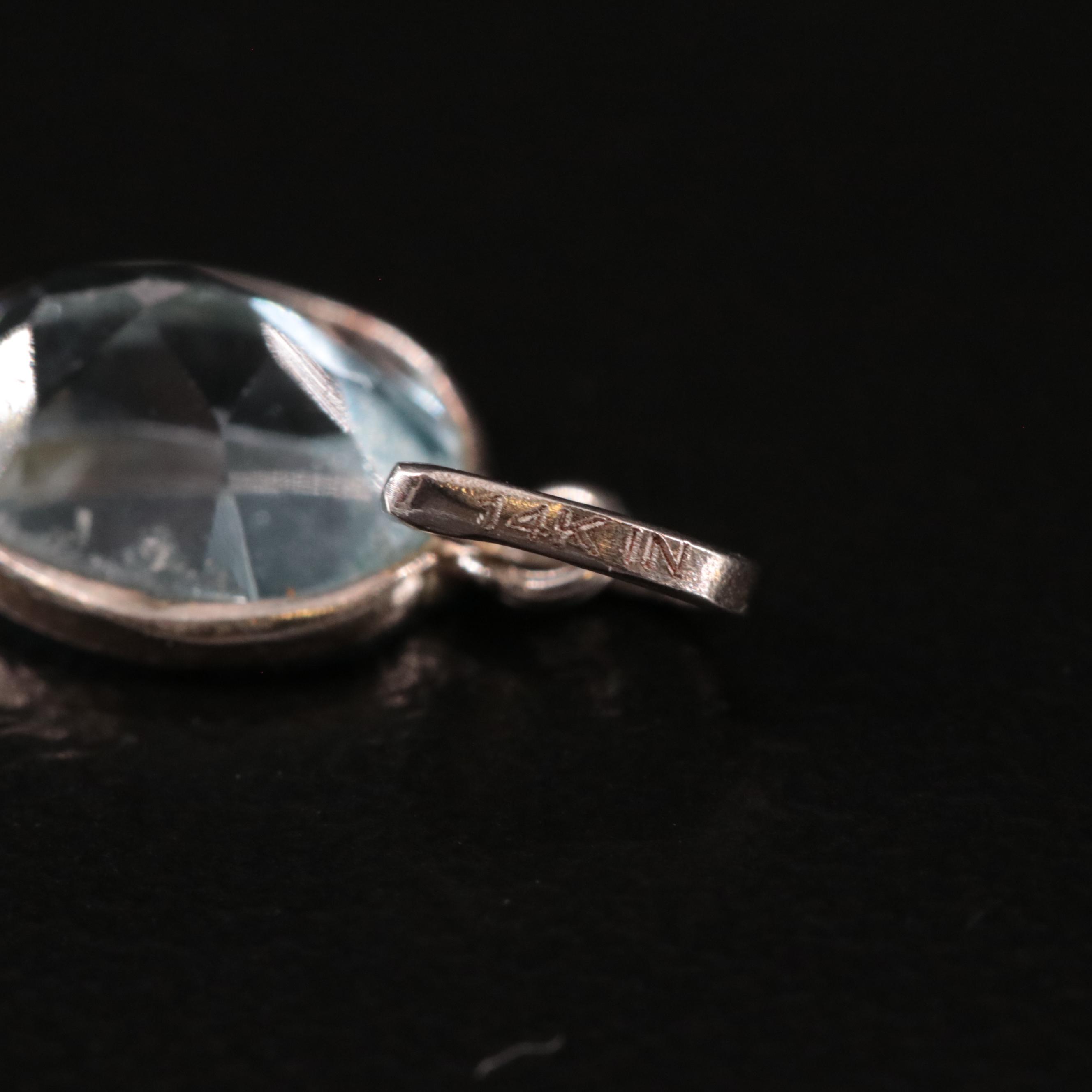 14K Blue Topaz Pendant