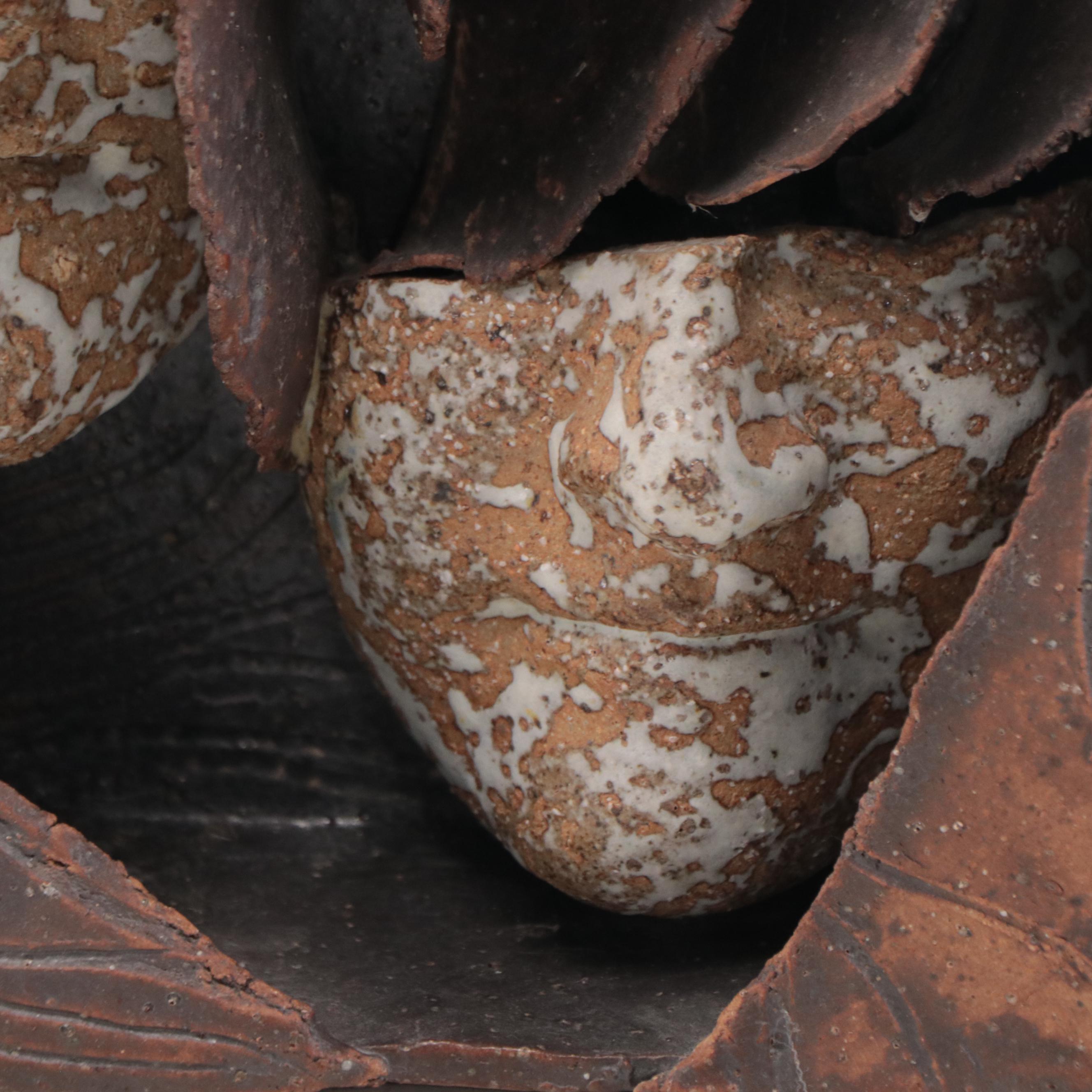 Sutherland Ceramic Wall Sculpture With Faces, 1982
