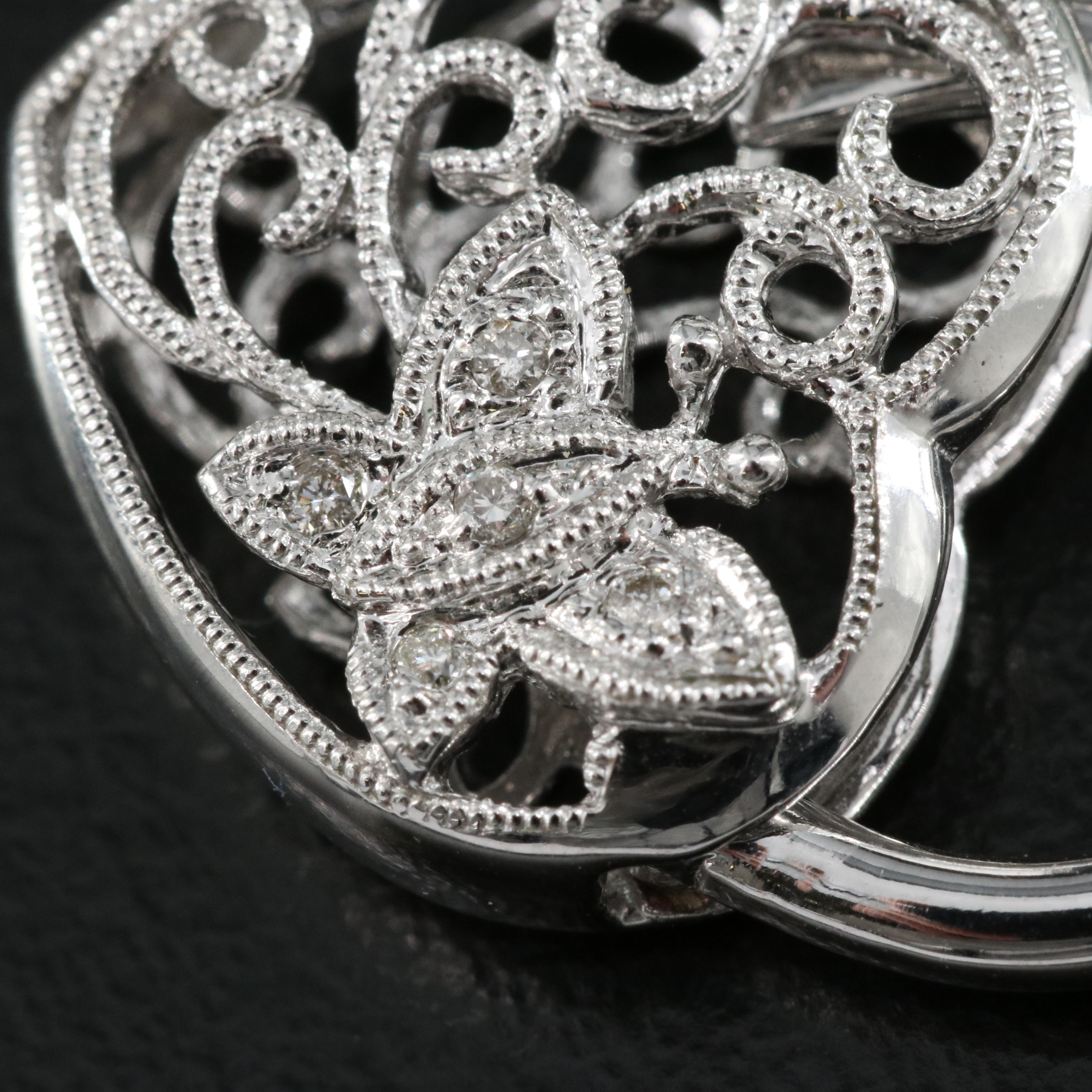 14K 0.05 CTW Diamond Butterfly Heart Locket