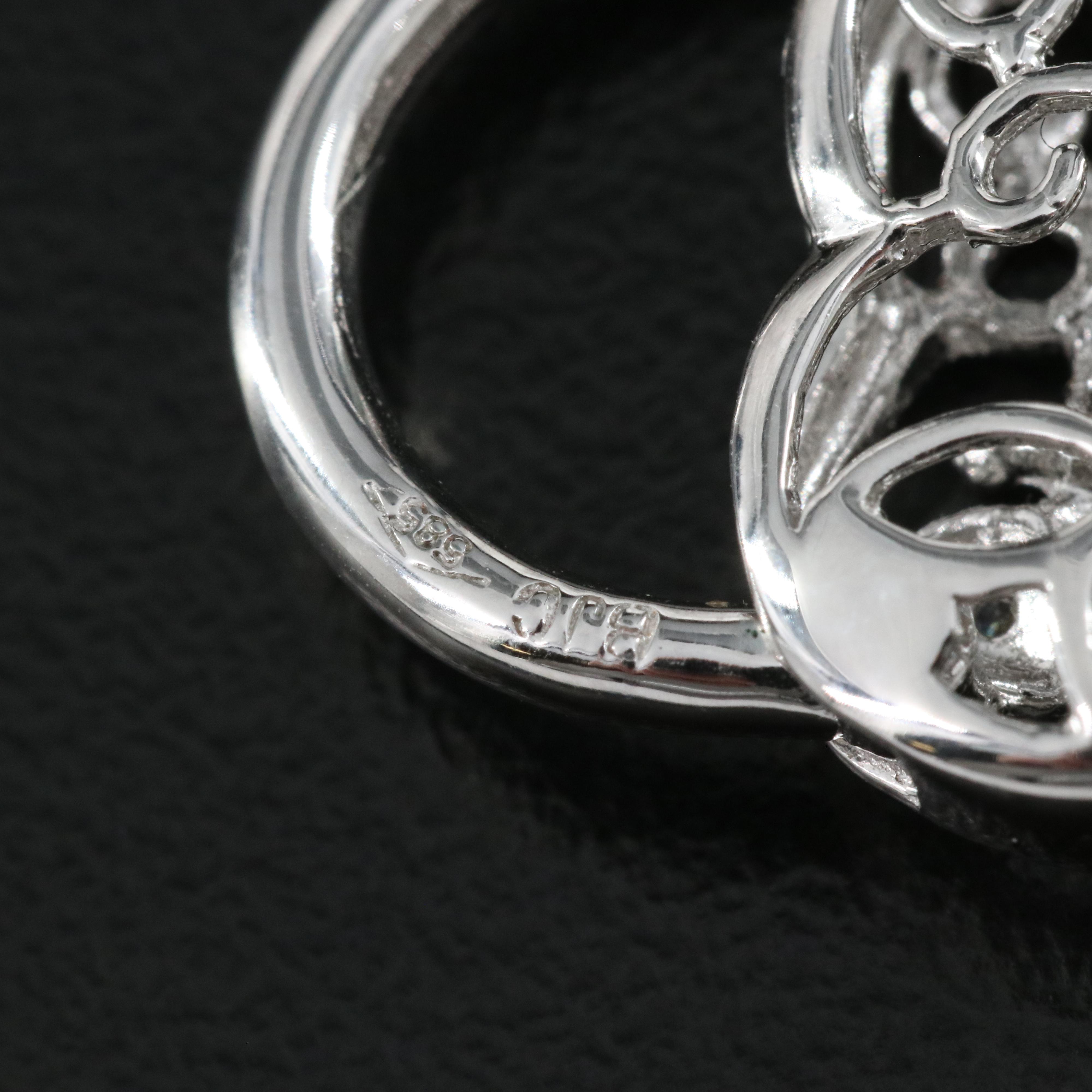 14K 0.05 CTW Diamond Butterfly Heart Locket