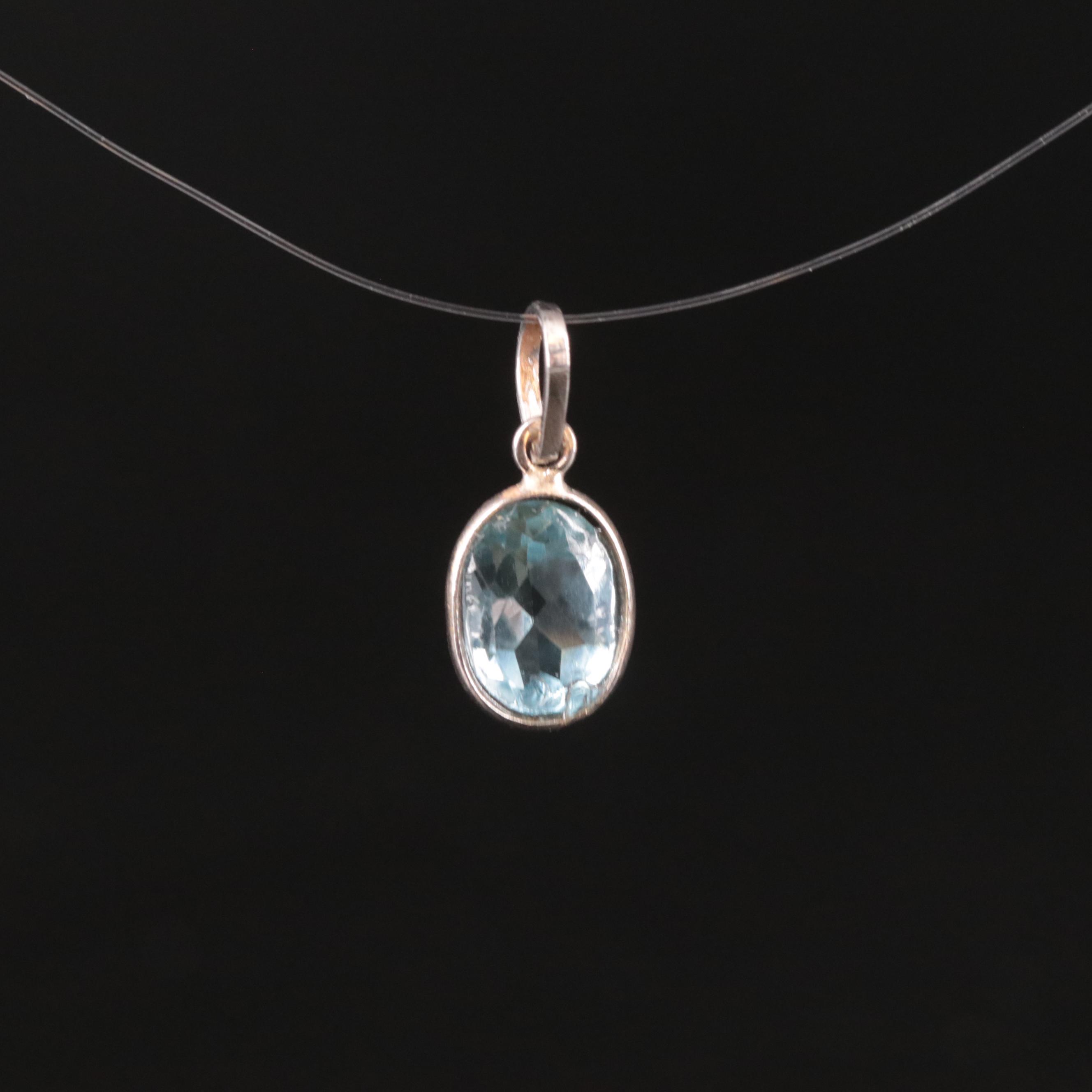 14K Blue Topaz Pendant