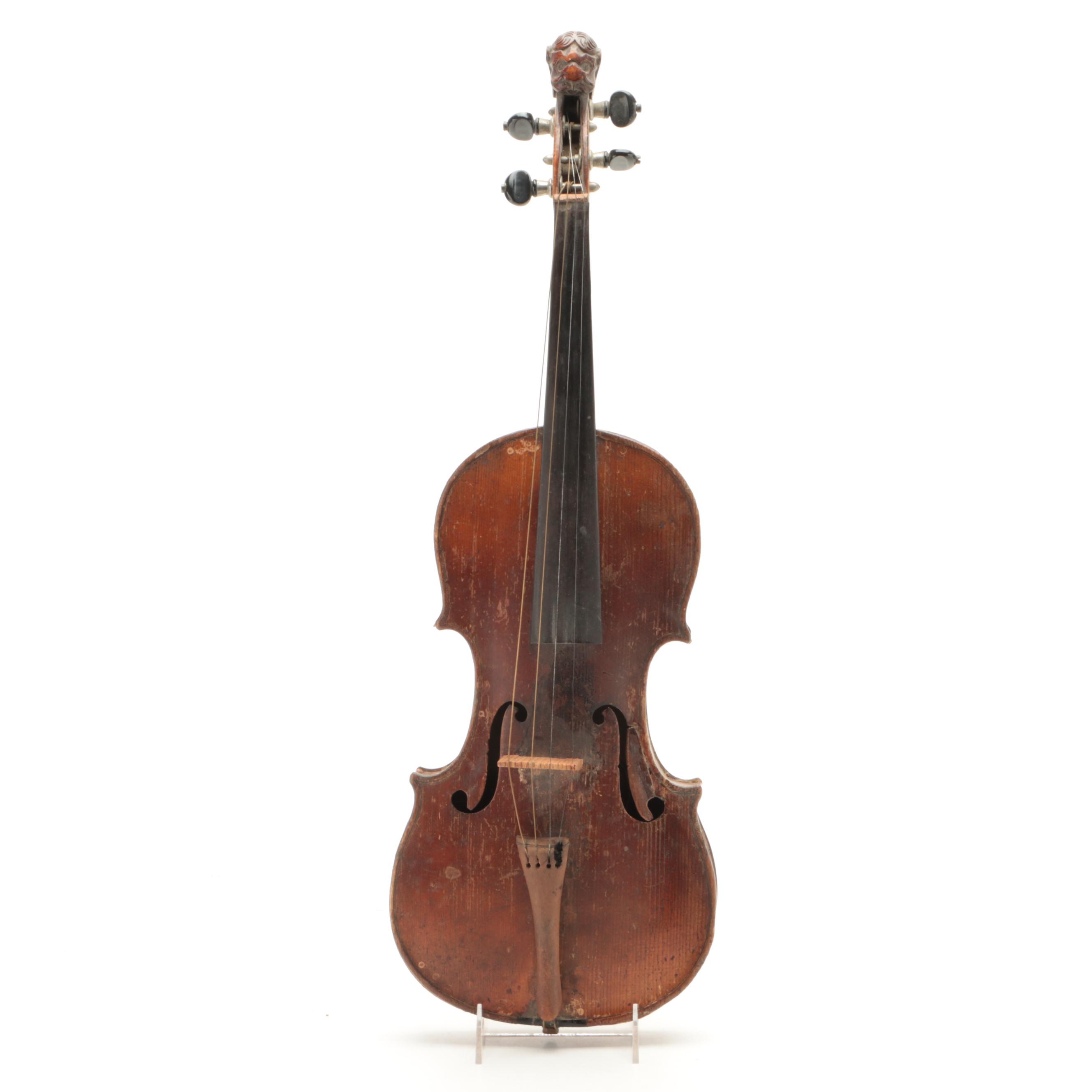 German 4/4 Violin with Carved Lion Head Scroll and Coffin Case, 19th C.