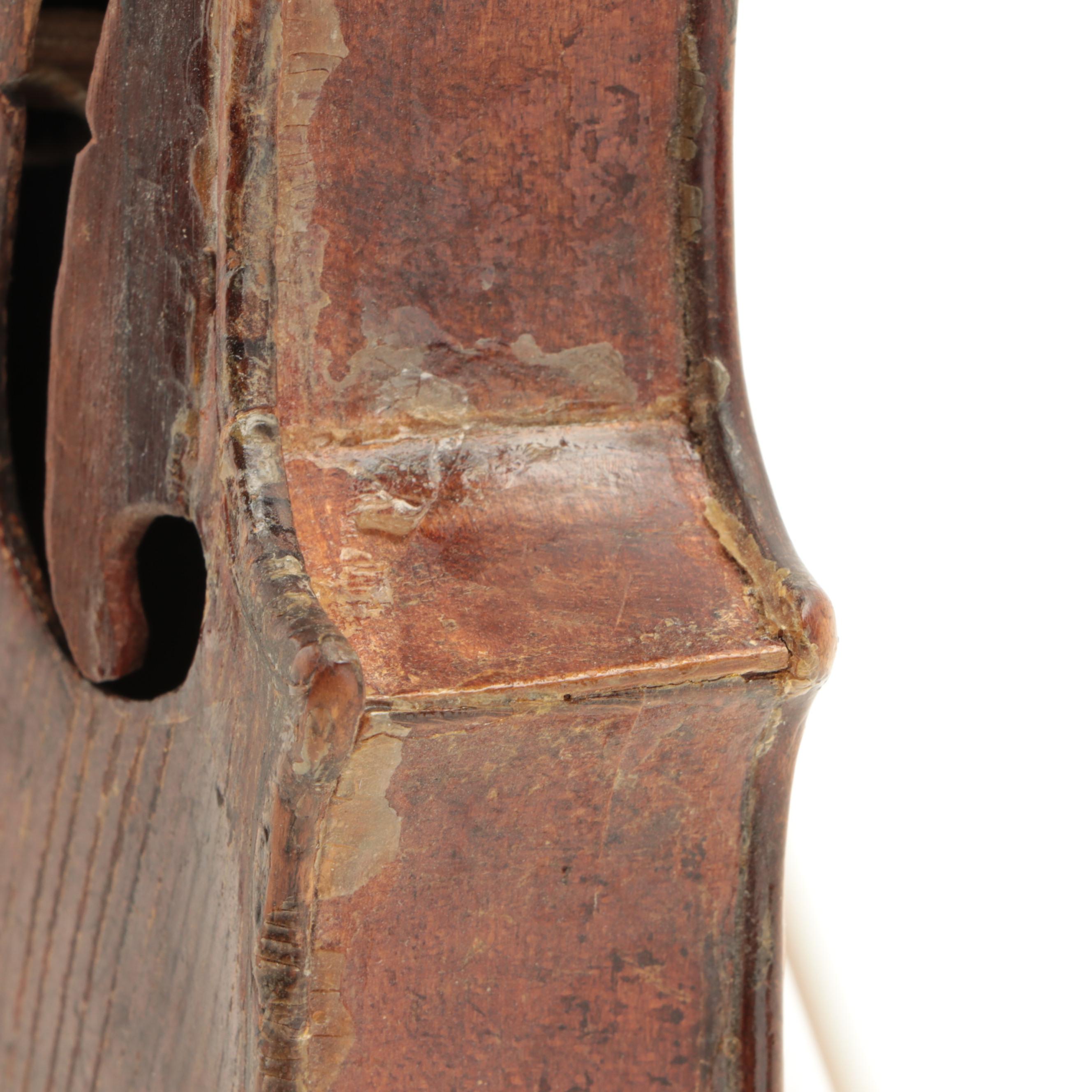 German 4/4 Violin with Carved Lion Head Scroll and Coffin Case, 19th C.