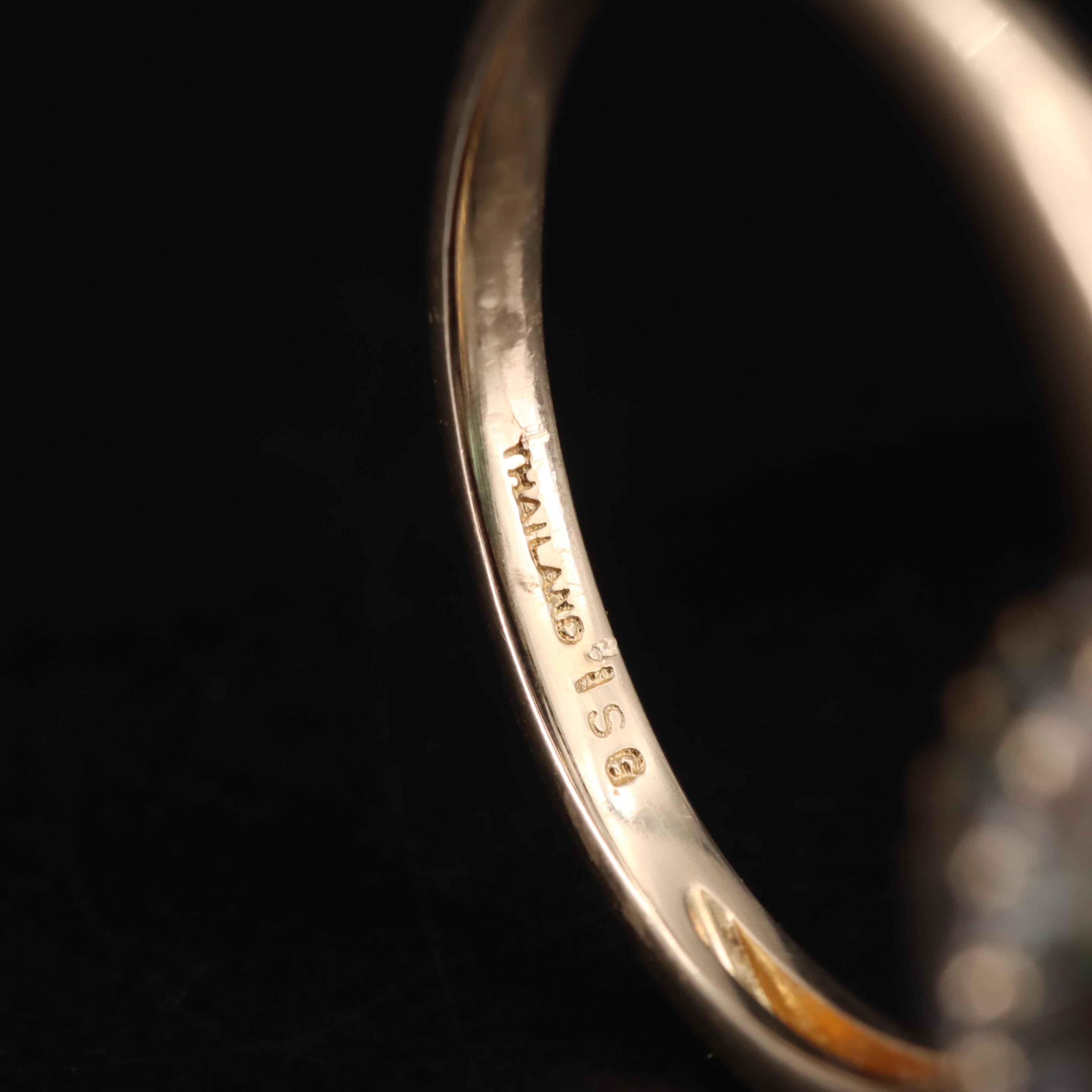 14K Emerald and Diamond Halo Ring