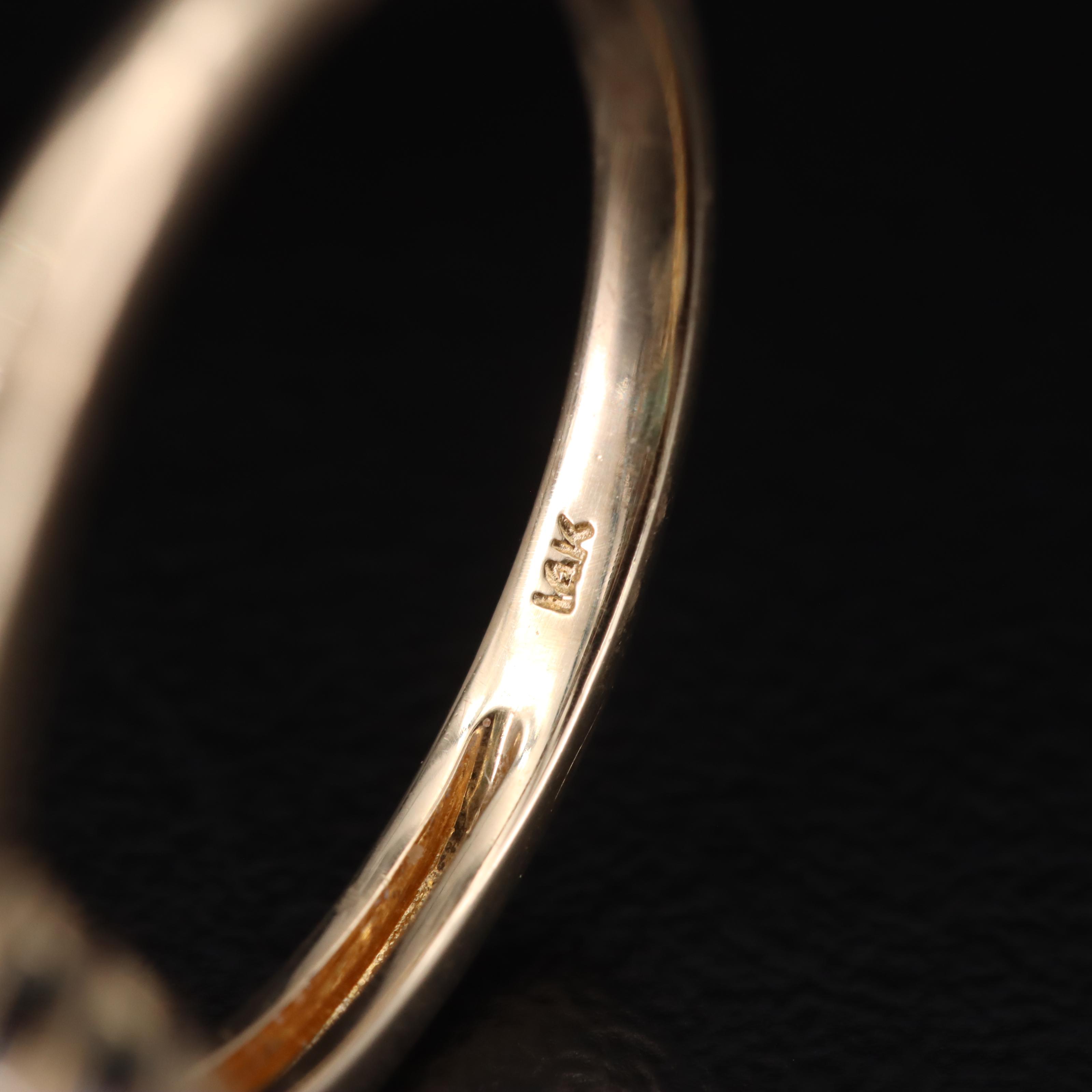 14K Emerald and Diamond Halo Ring