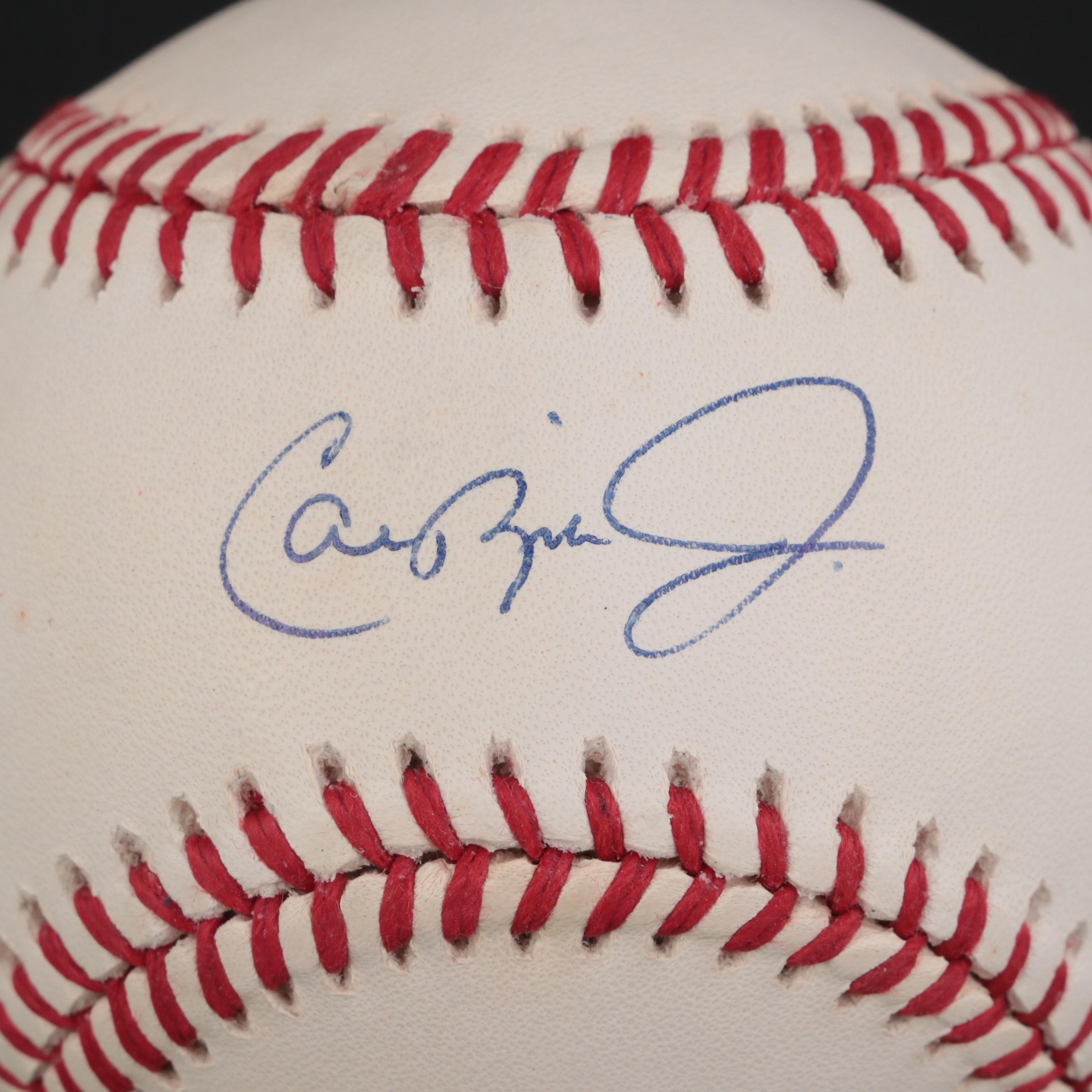 Ripken Jr. Signed Rawlings Baseball on "All-Time Consecutive Games Leader" Stand