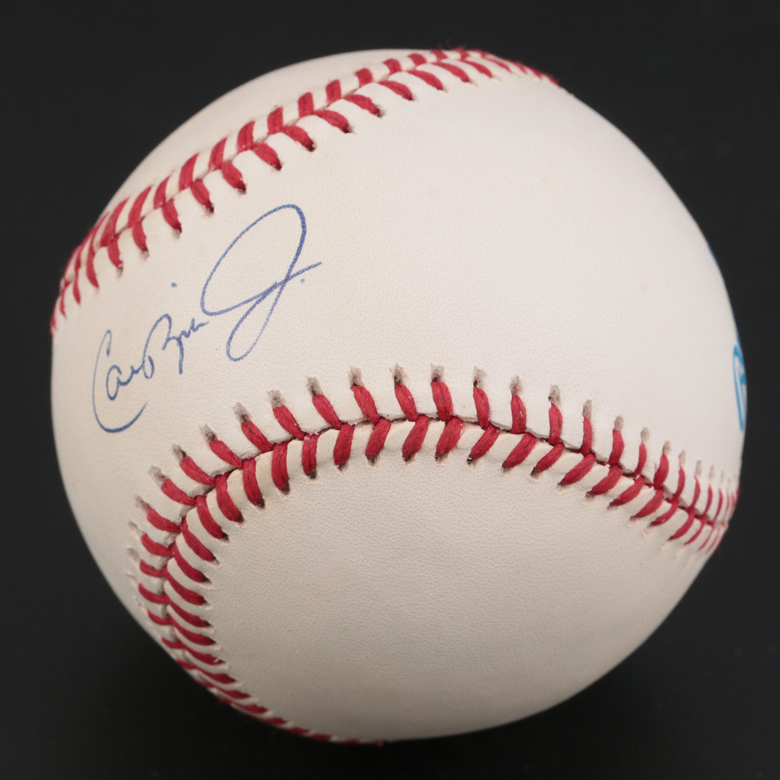 Ripken Jr. Signed Rawlings Baseball on "All-Time Consecutive Games Leader" Stand