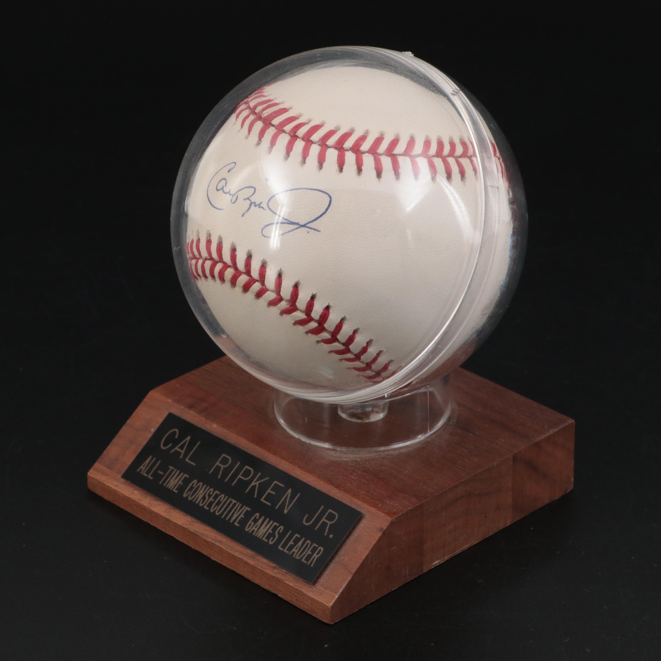 Ripken Jr. Signed Rawlings Baseball on "All-Time Consecutive Games Leader" Stand